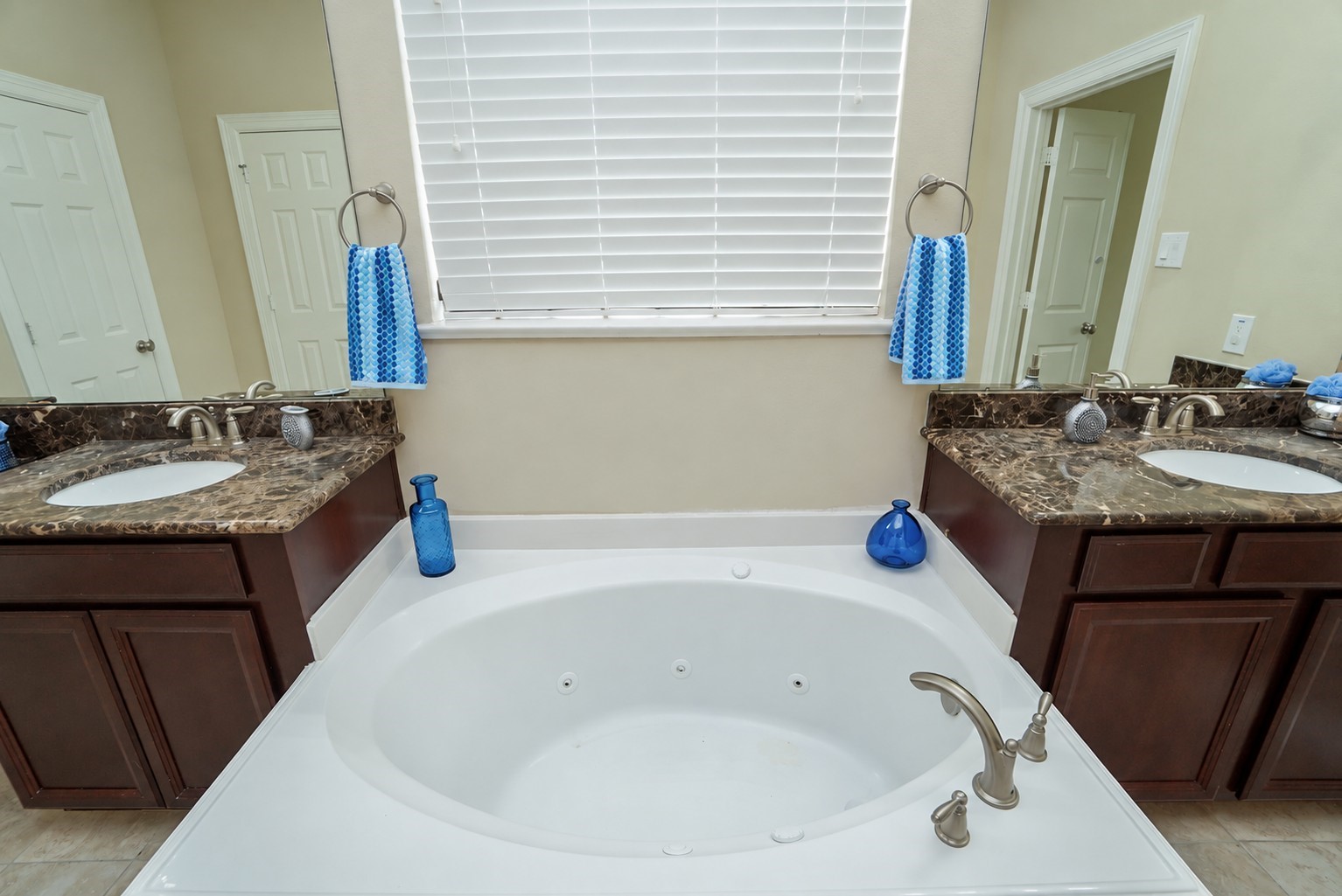 Large soaking tub is the focal point of this primary bathroom.