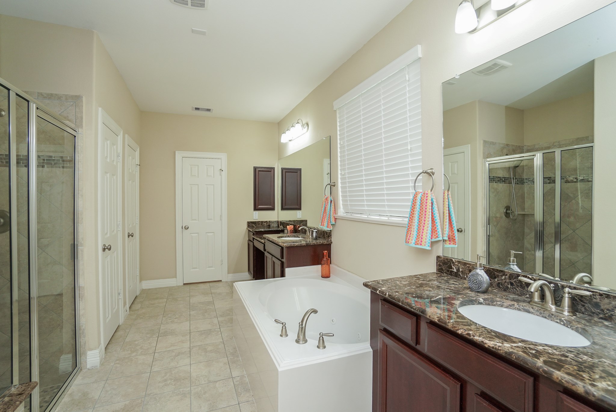 Wow!!  Seperate shower and bath, dual vanities, and lots of storage for your all our needs are sure to impress.