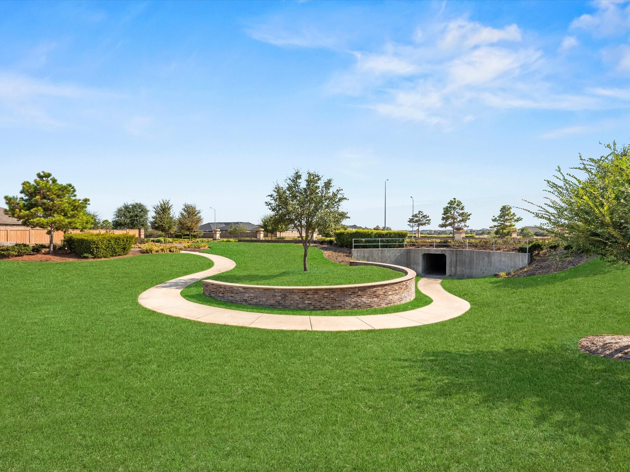 Just two doors down, there's a cross-under to the lake and walking trail and short cut to the amenity center. Don't even have to cross the street!