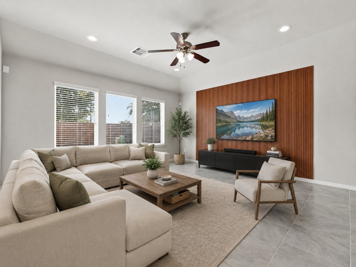 Accent wall decorates that special space to set up your entertainment center and comfy family room sofas, etc... (VS)