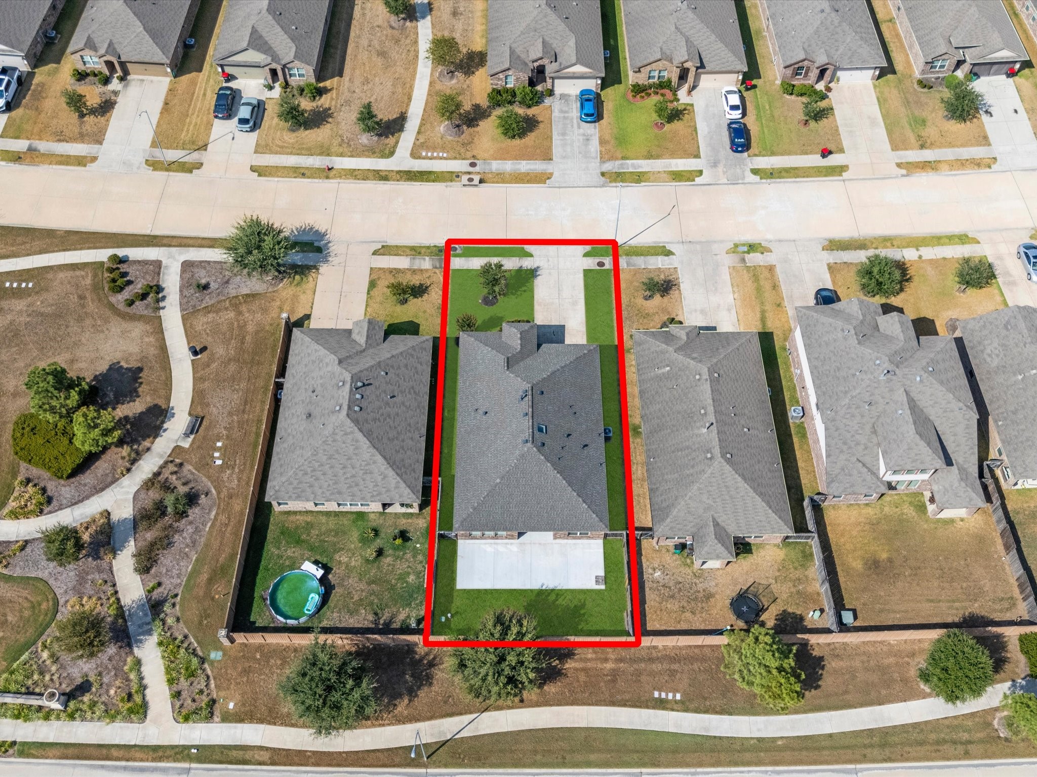 Here you can see the park and cross-under to get to the lake behind the houses.
