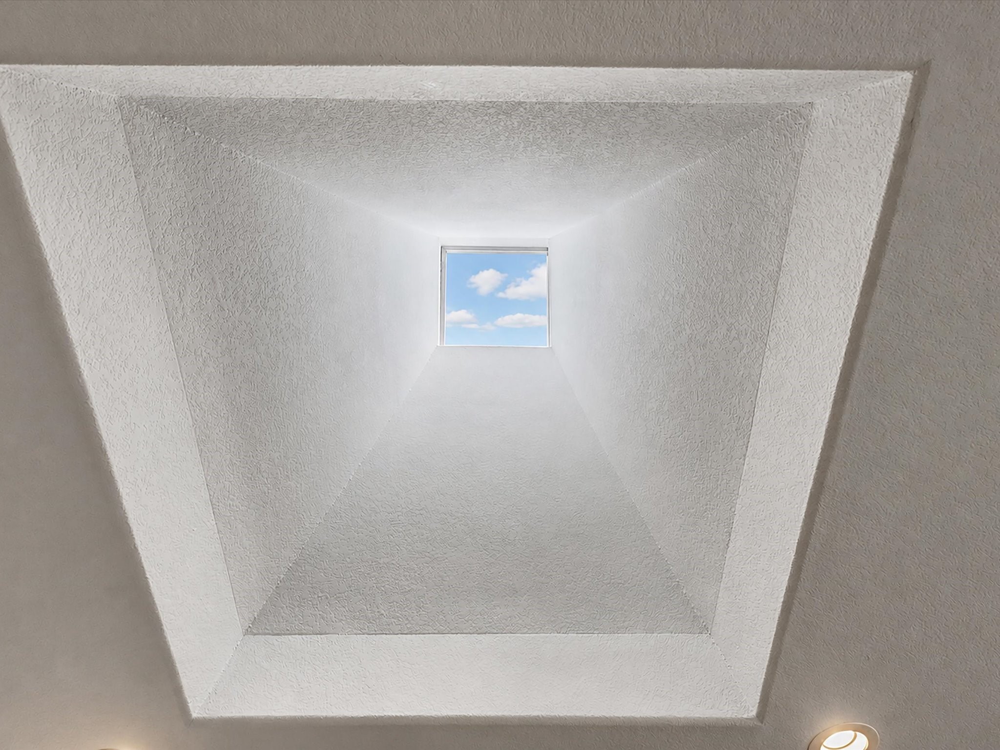 Look closely! This is the skylight located directly above the prep island in the kitchen!