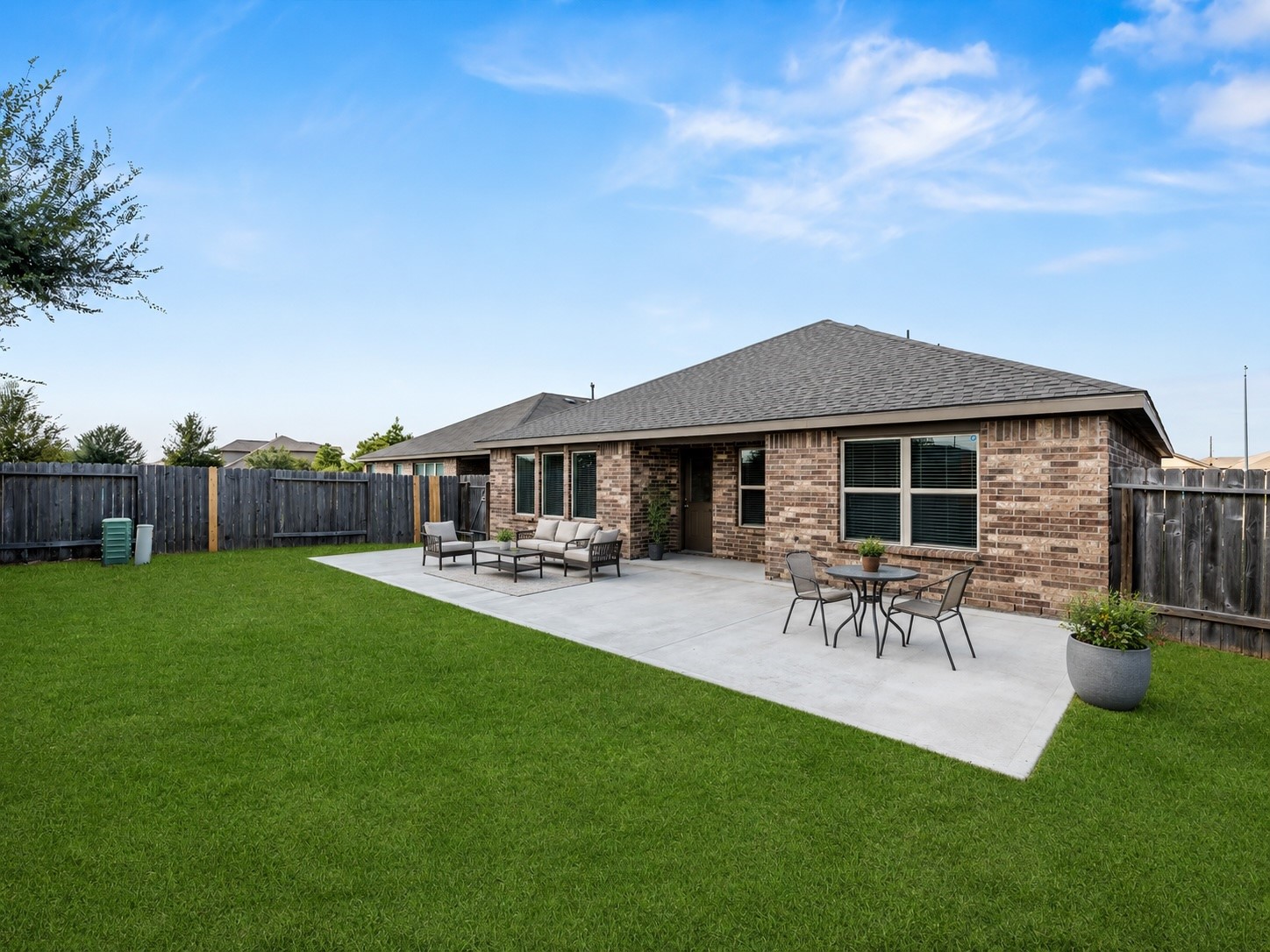 This home comes with a extended patio... set up the BBQ on one end and a firepit on the other! AND there's still room!! (VS)