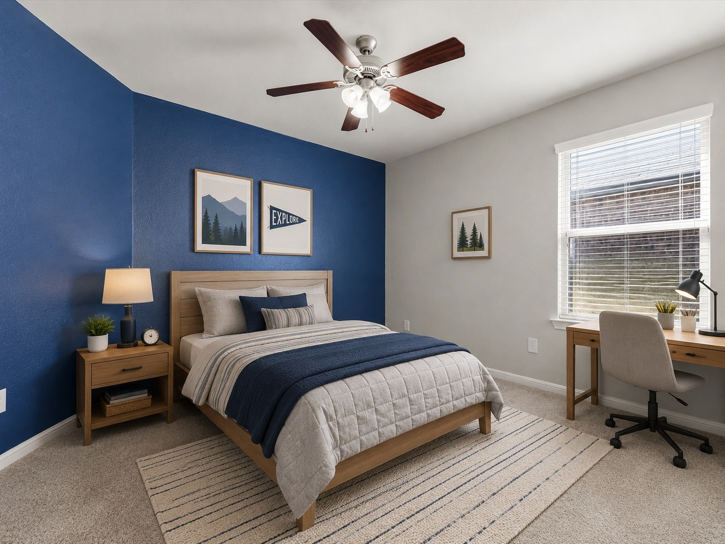 Secondary bedroom with beautiful blue accent wall. (VS)