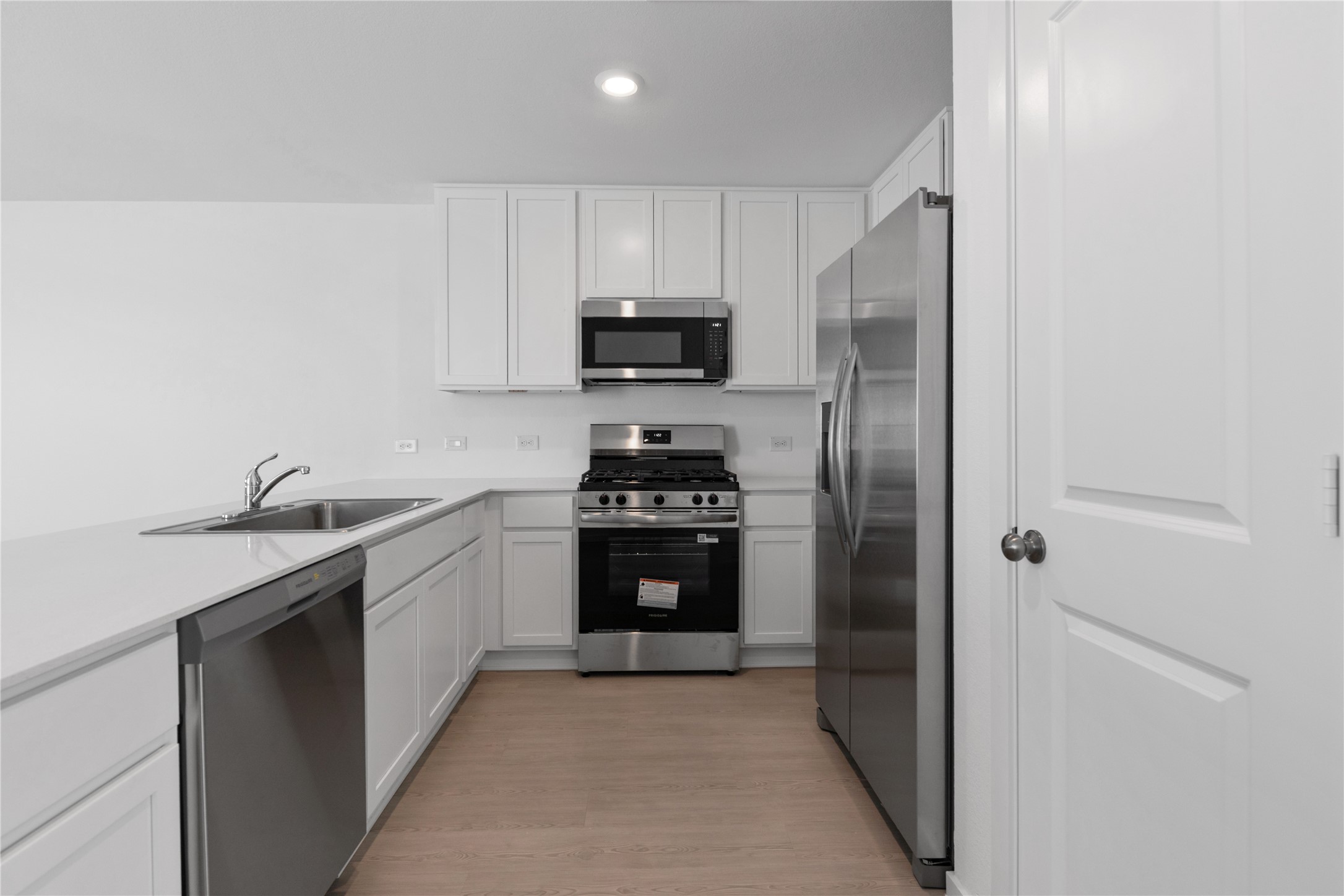 Kitchen overview w/ stainless steel appliances Kitchen overview w/ stainless steel appliances
