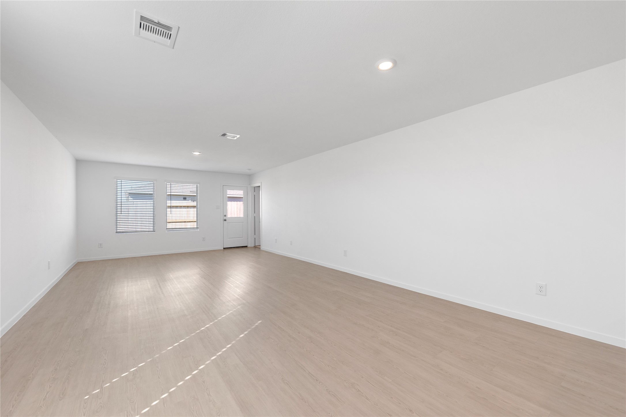 Secondary view of dining room and living room