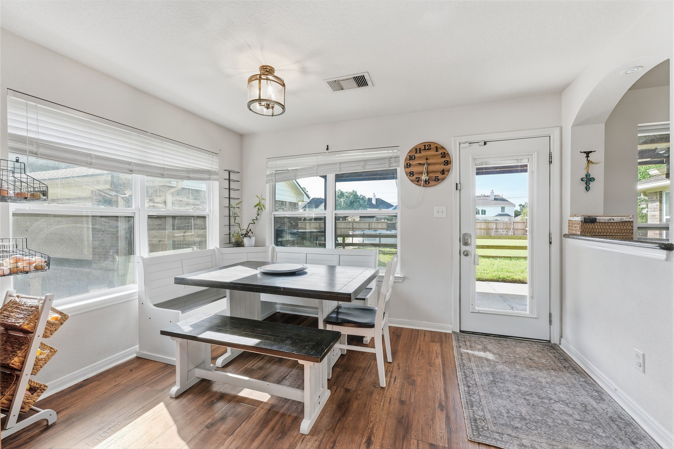 Enjoy everyday meals in the breakfast and dining nook overlooking the beautiful backyard.