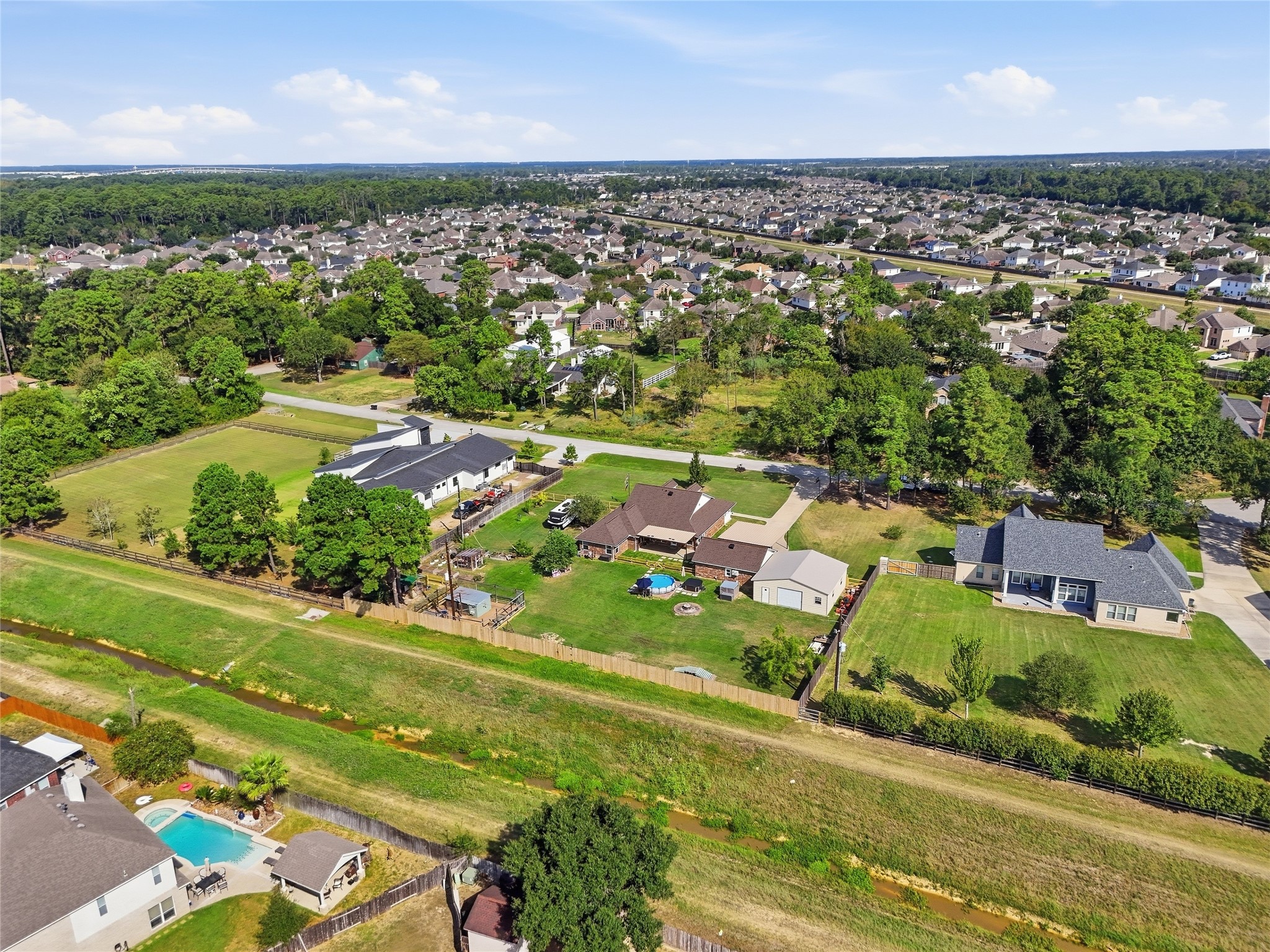 Enjoy a fully fenced backyard with no rear neighbors and convenient gate access to the jogging and biking trail behind the property. Enjoy a fully fenced backyard with no rear neighbors and convenient gate access to the jogging and biking trail behind the property.