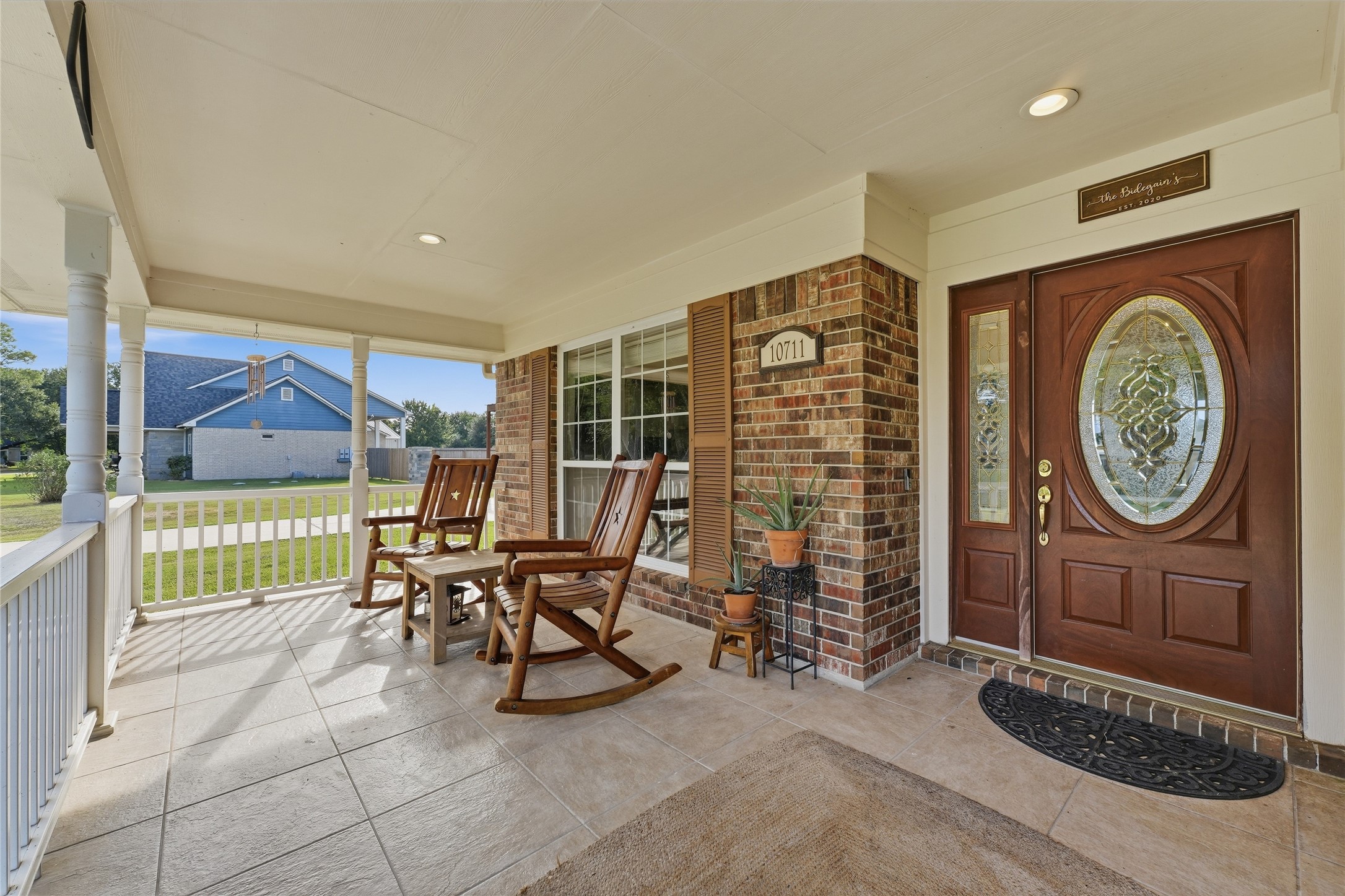 A spacious covered front porch invites you to slow down and enjoy the country lifestyle, with room for rocking chairs, morning coffee and gathering with guests. A spacious covered front porch invites you to slow down and enjoy the country lifestyle, with room for rocking chairs, morning coffee and gathering with guests.