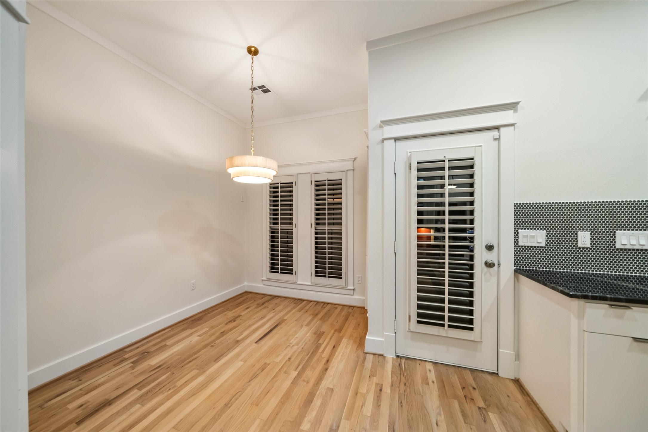 A charming breakfast space offers a relaxed setting for morning coffee and casual meals.