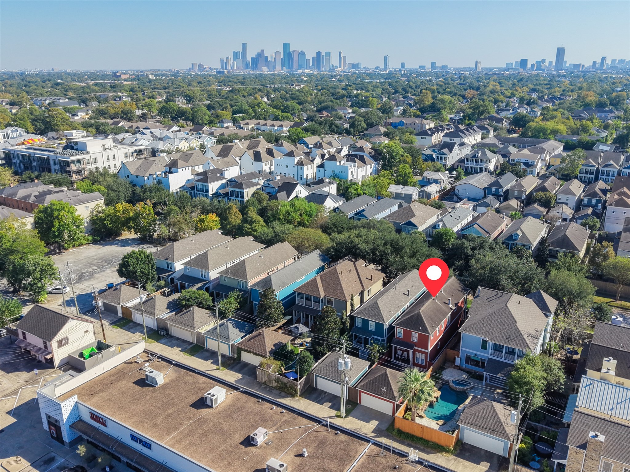 Convenient alley access provides practical parking and easy entry to the detached garage.