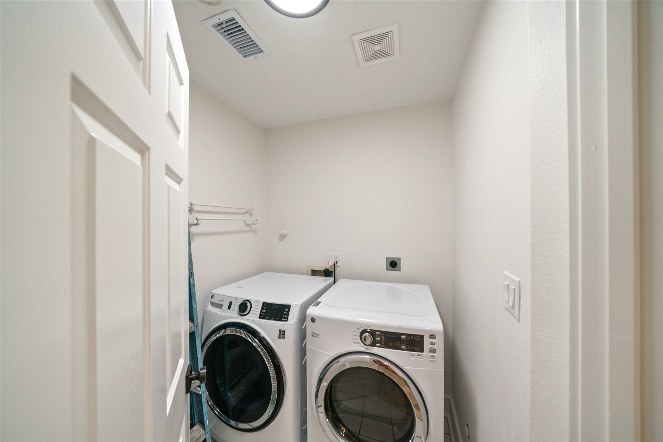 An indoor laundry area makes daily routines convenient and efficient.