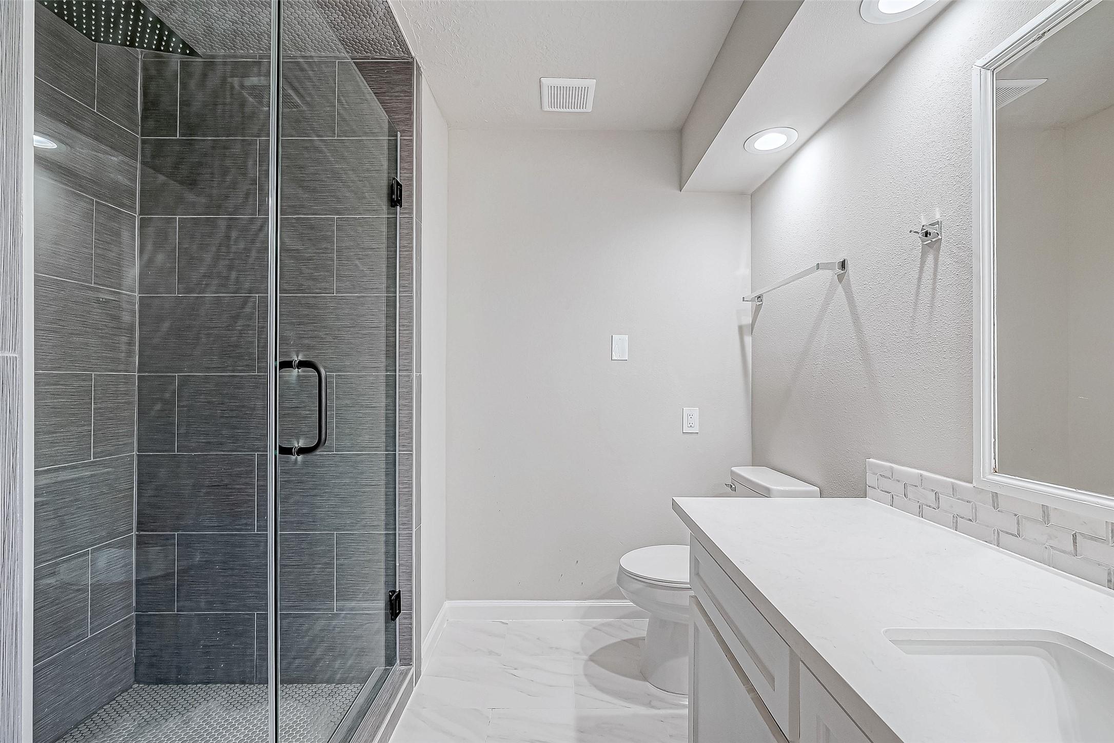Glass-enclosed shower