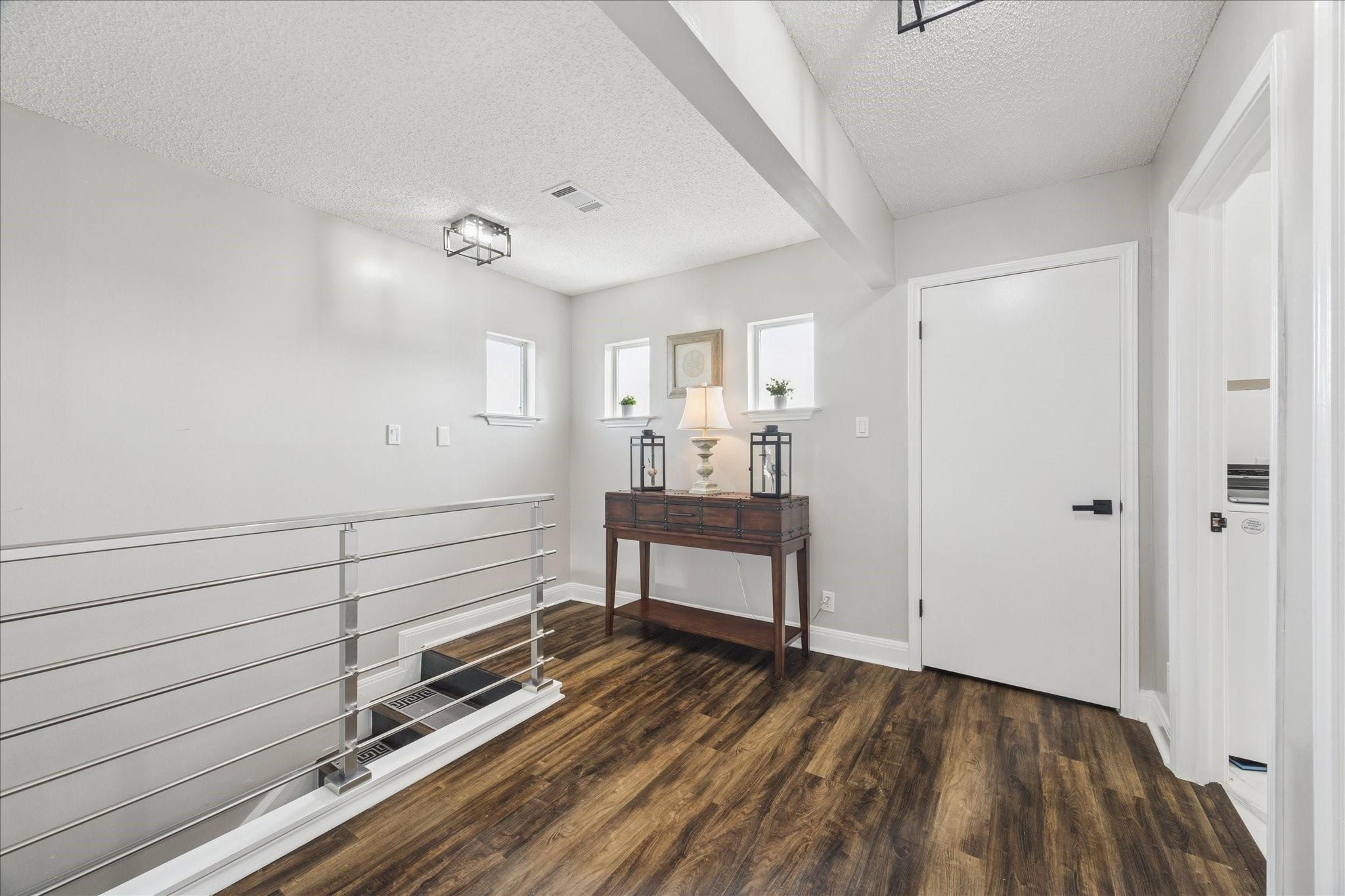 Primary landing with 3 extra closets