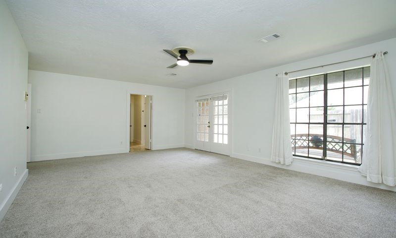 very large  very light & bright primary down overlooking the back yard