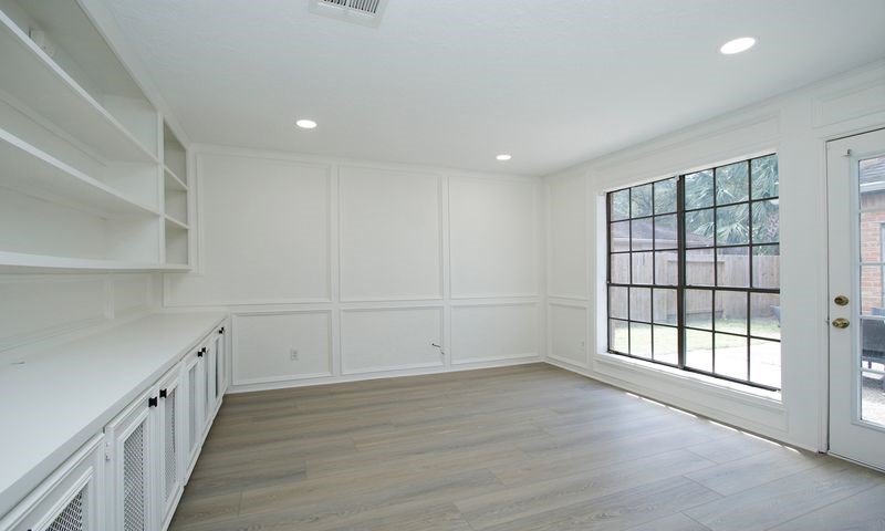 large study with built in desk file cabinets and lots of storage