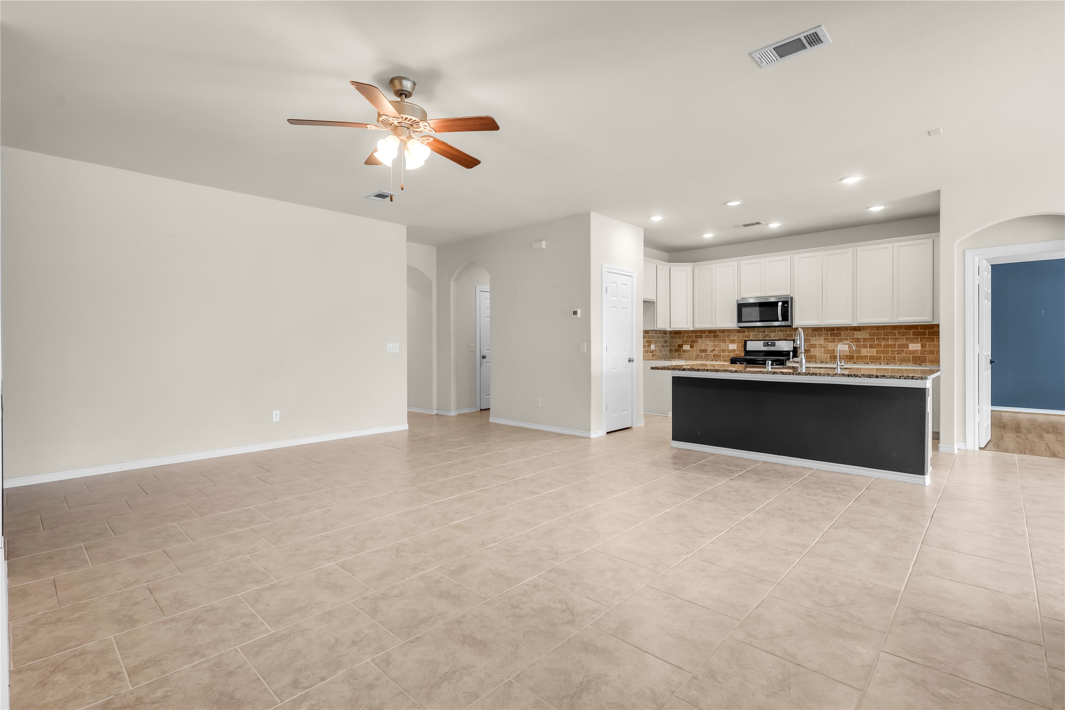 View of living area  to kitch open concept