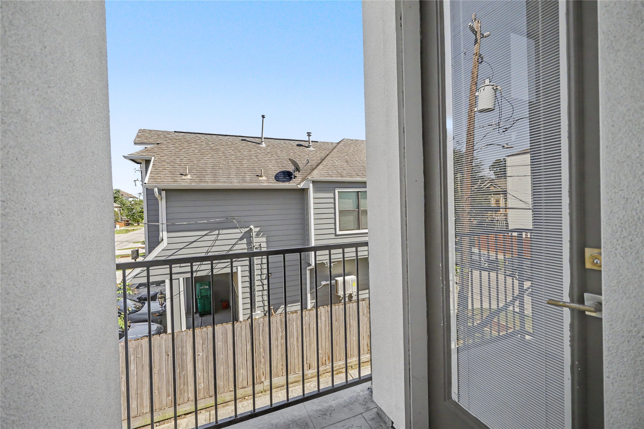 A look at the covered balcony just off the living room.