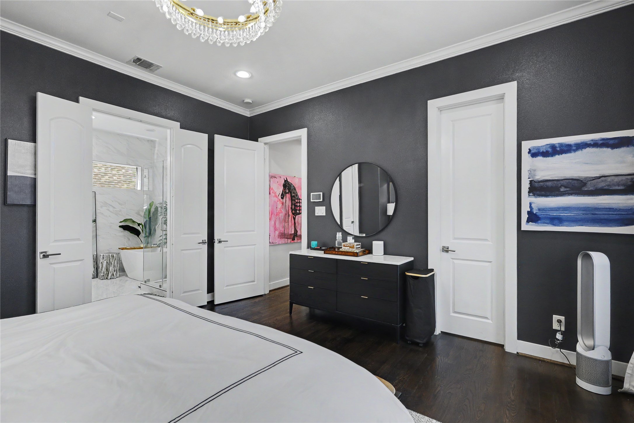 Large walk-in closet in this bedroom. Double French doors take you inside the spa bath.