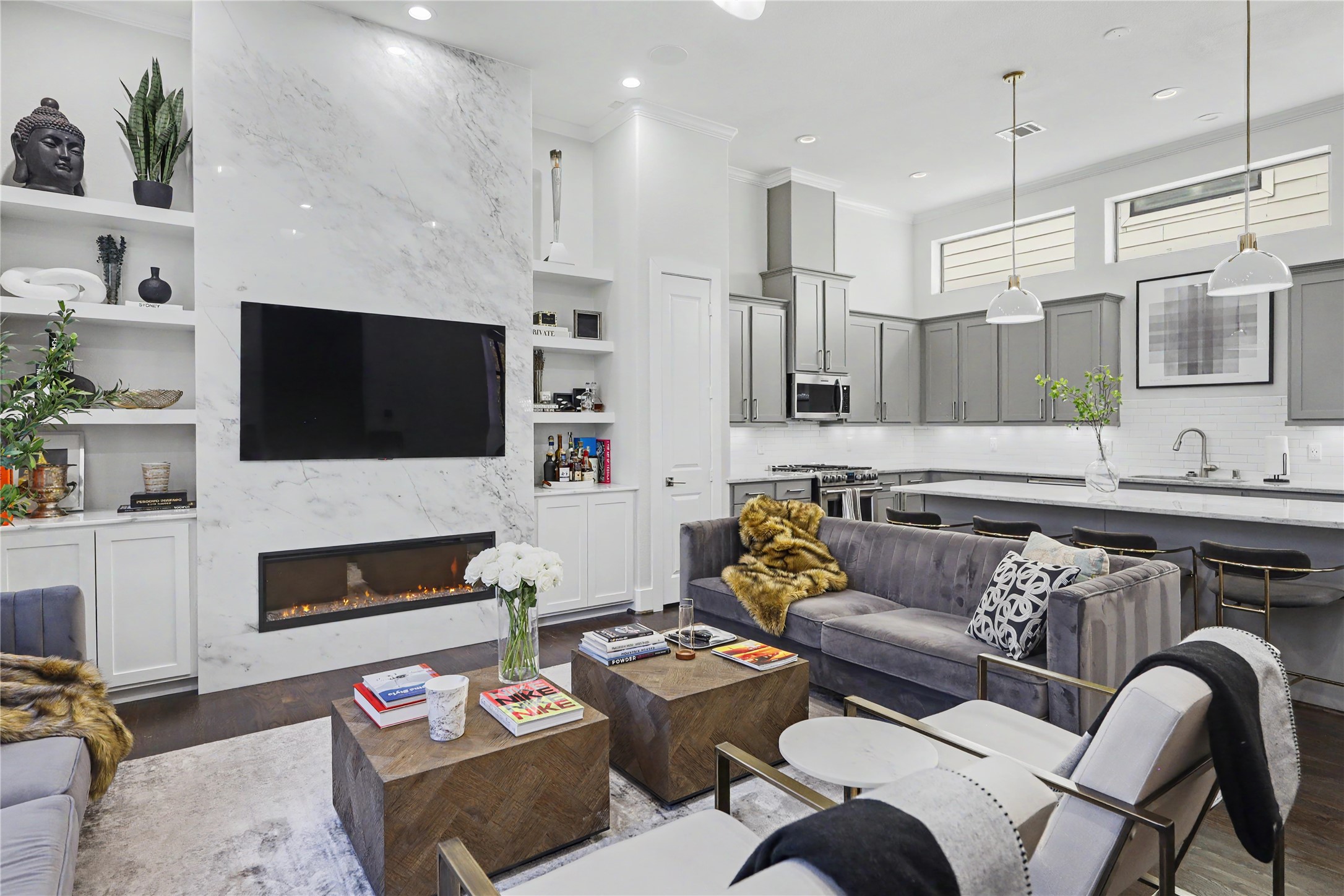 Welcome to the second floor in this open-concept floor plan with the living space flowing seamlessly into the island kitchen.