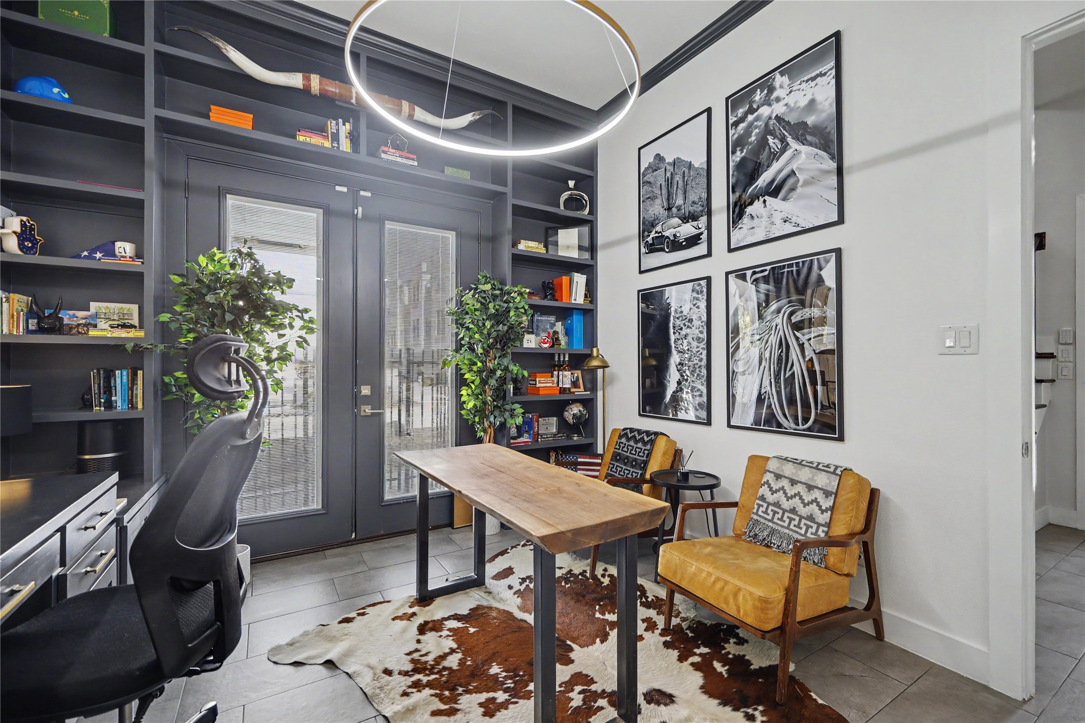 Elevated interiors and custom lighting. Double French doors lead to your backyard/side yard space.