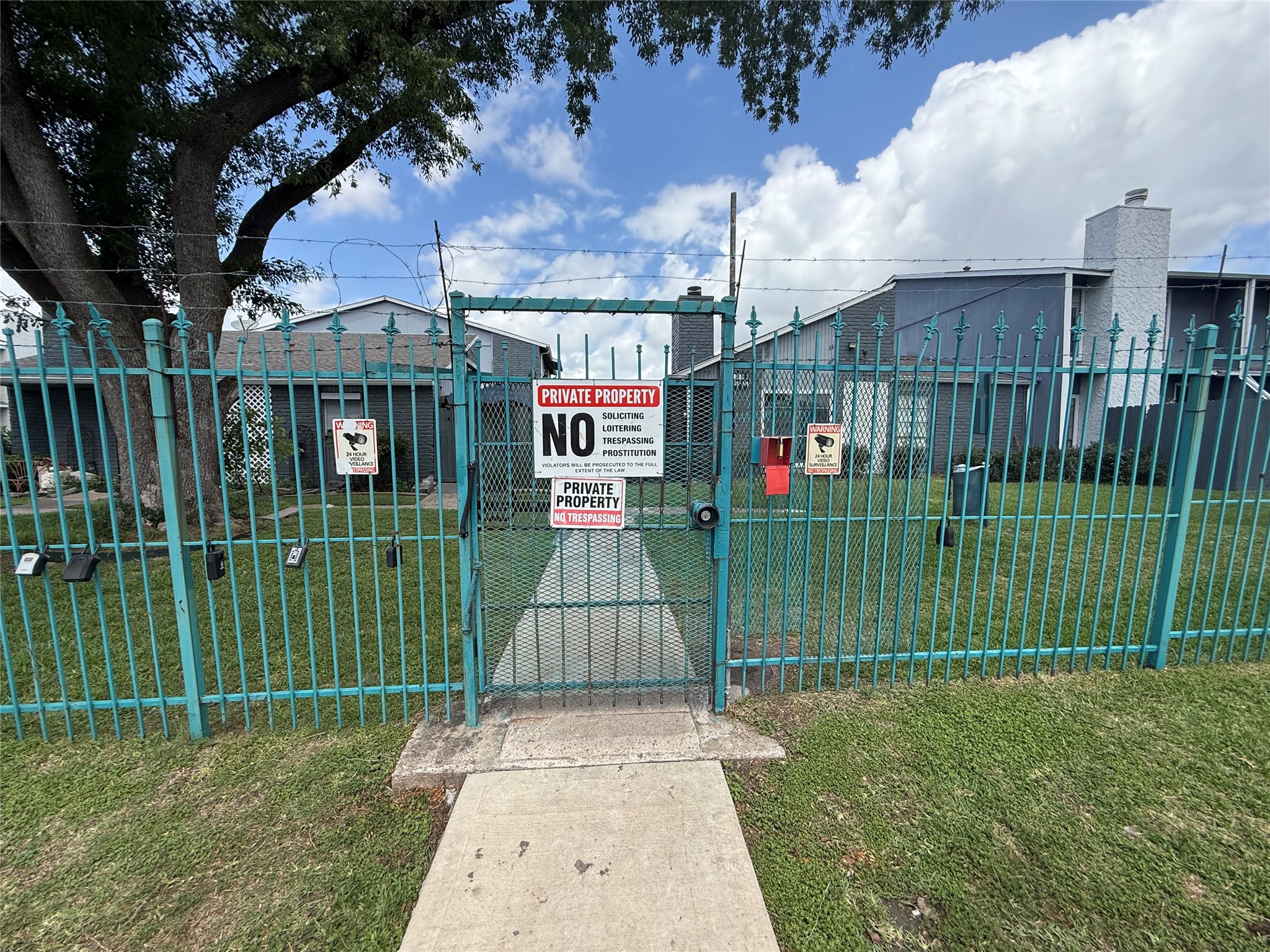 There is a gated pedestrian gate with plenty of parking along the street for guests.