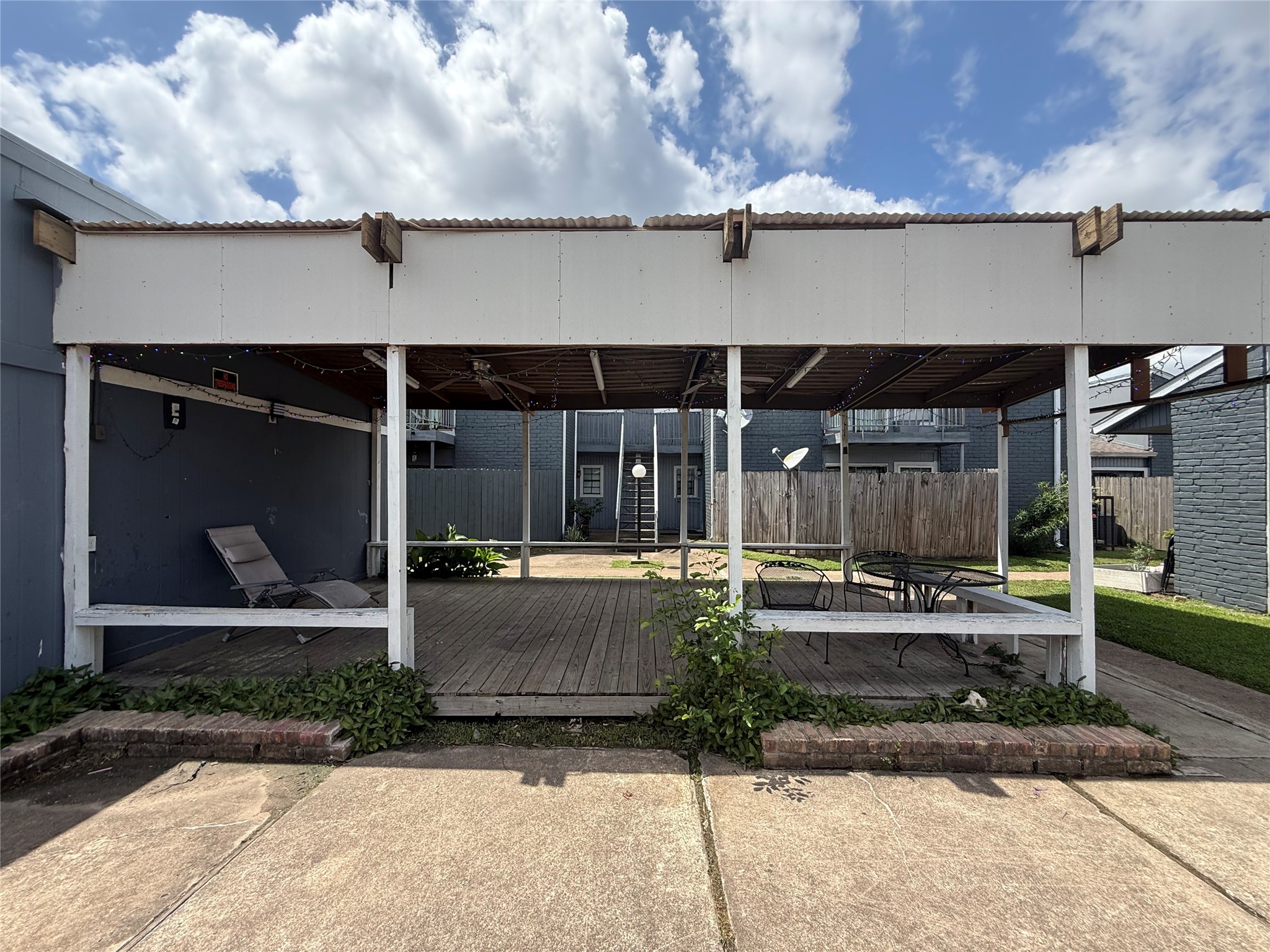 The courtyard even has a covered area for entertaining or relaxing outside with the neighbors.