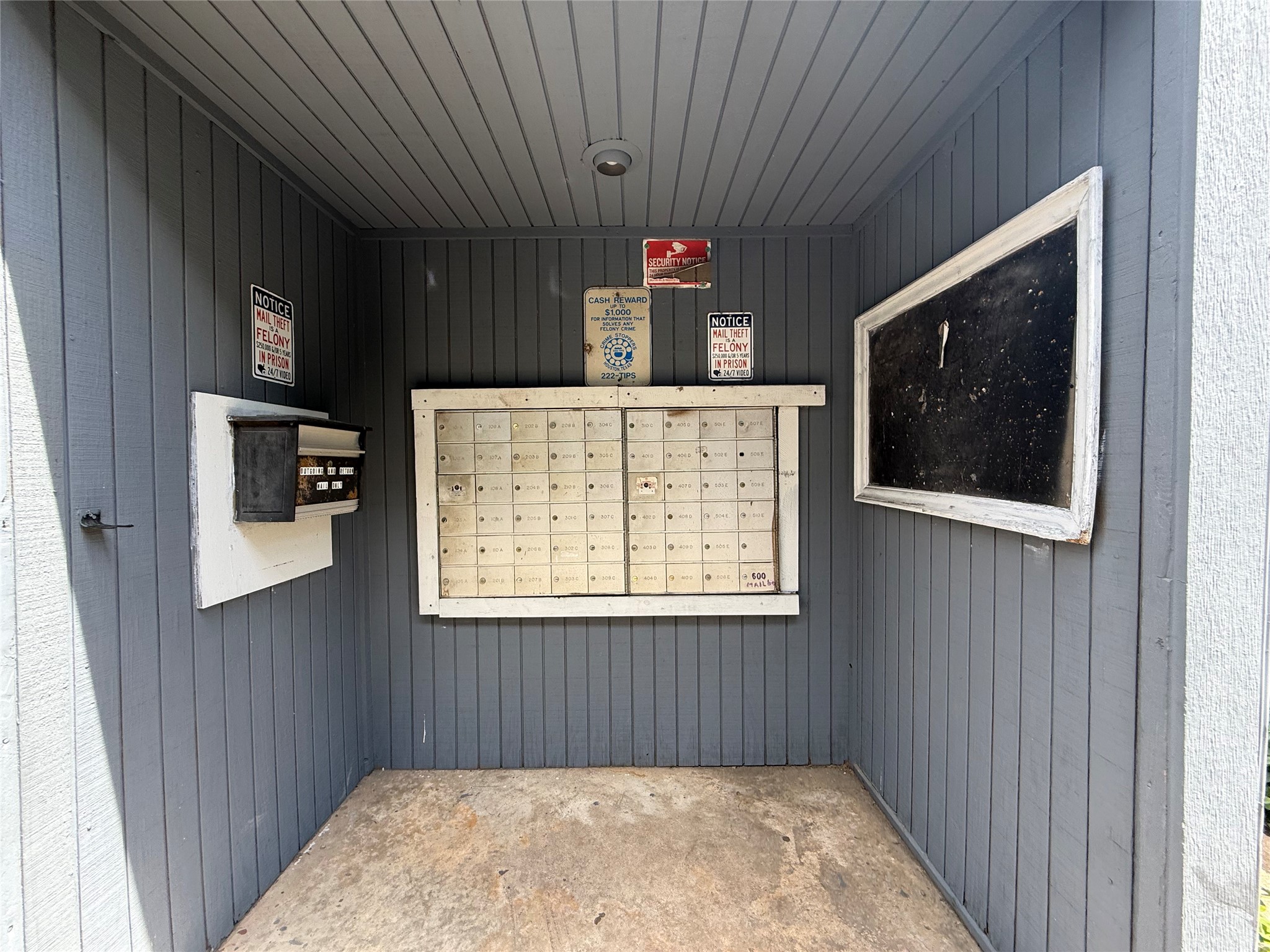 Mailboxes are located inside the complex gates in the courtyard area.
