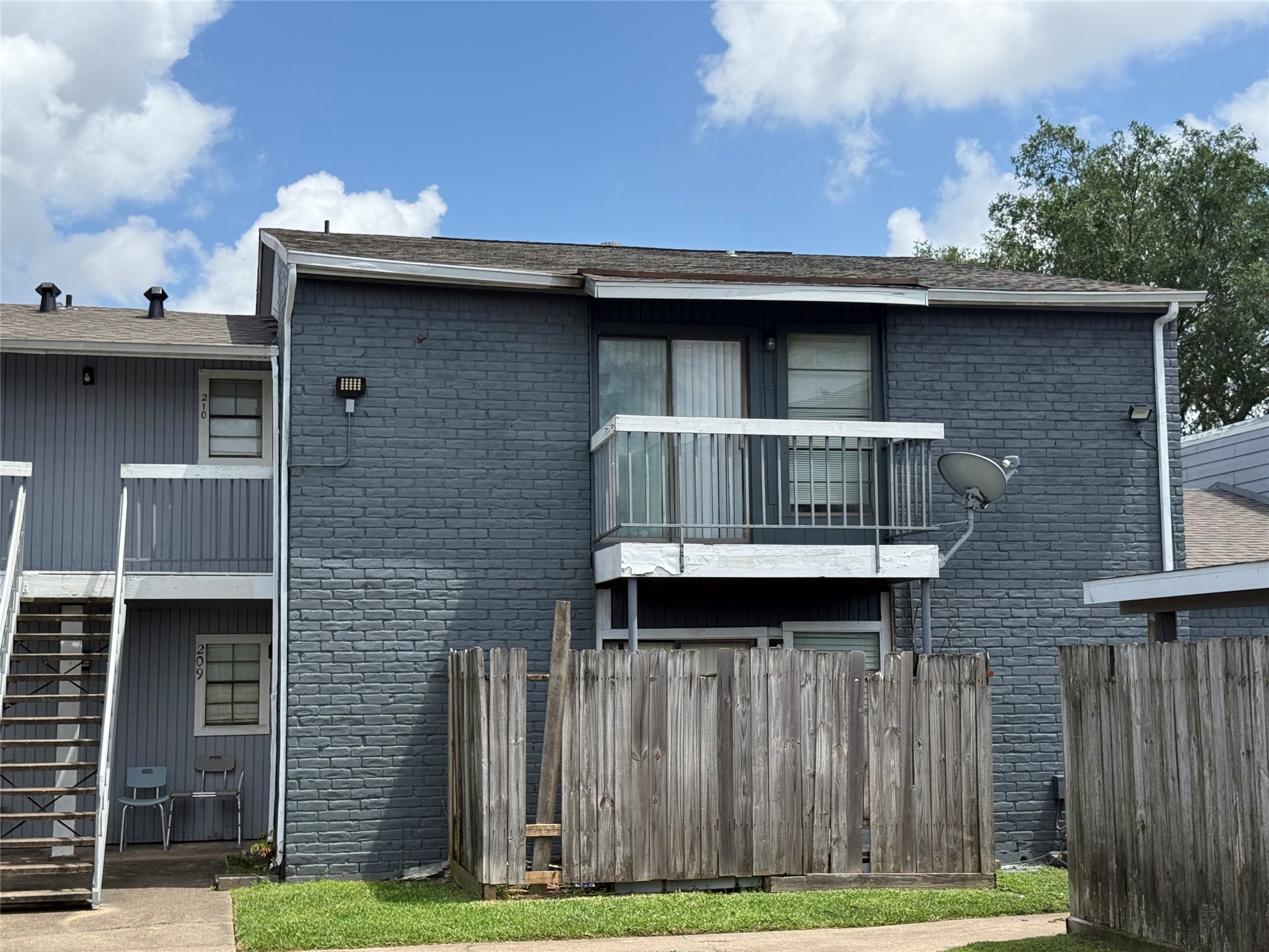 Second story unit with balcony.