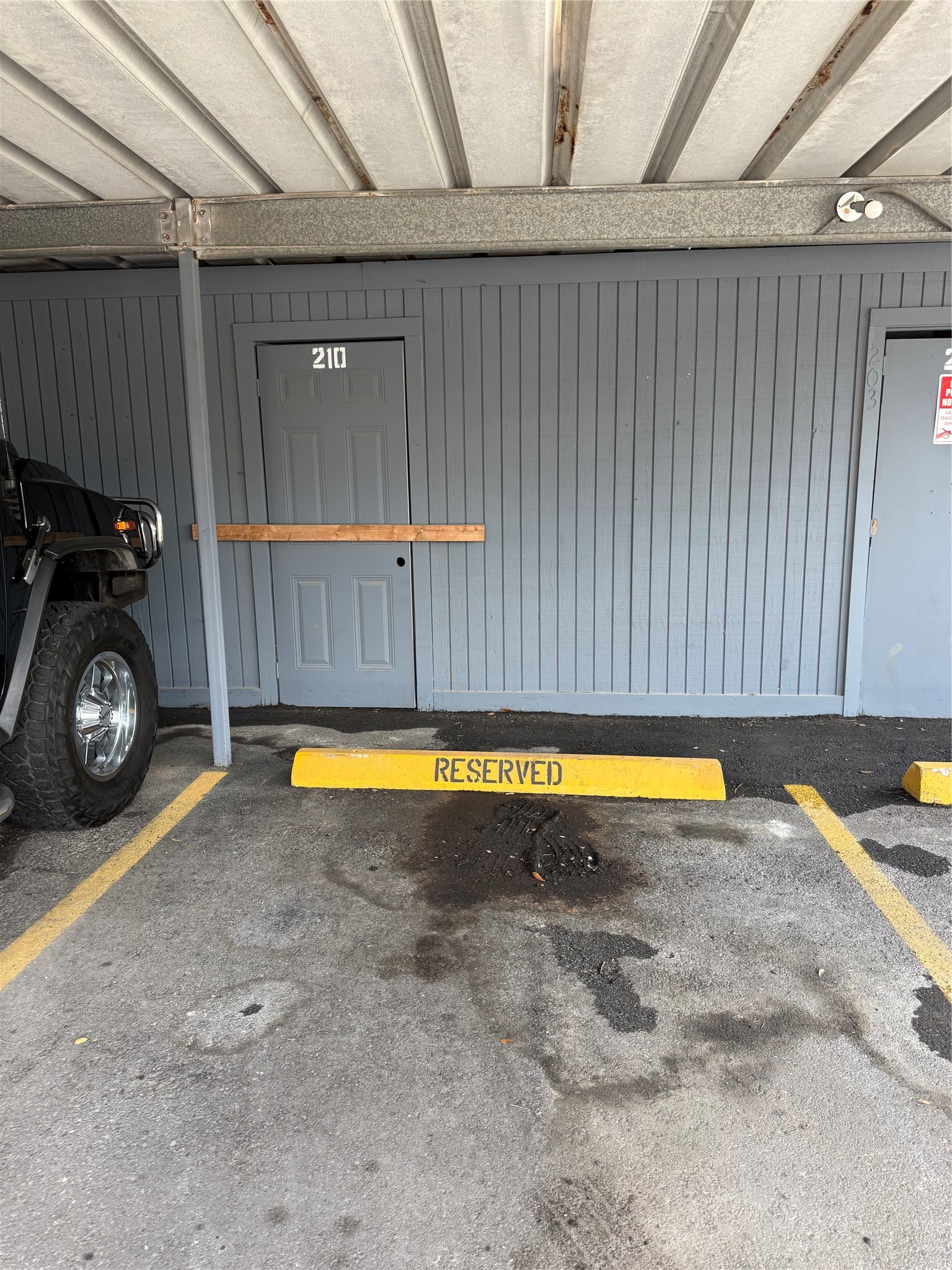 Assigned covered parking space and storage closet.