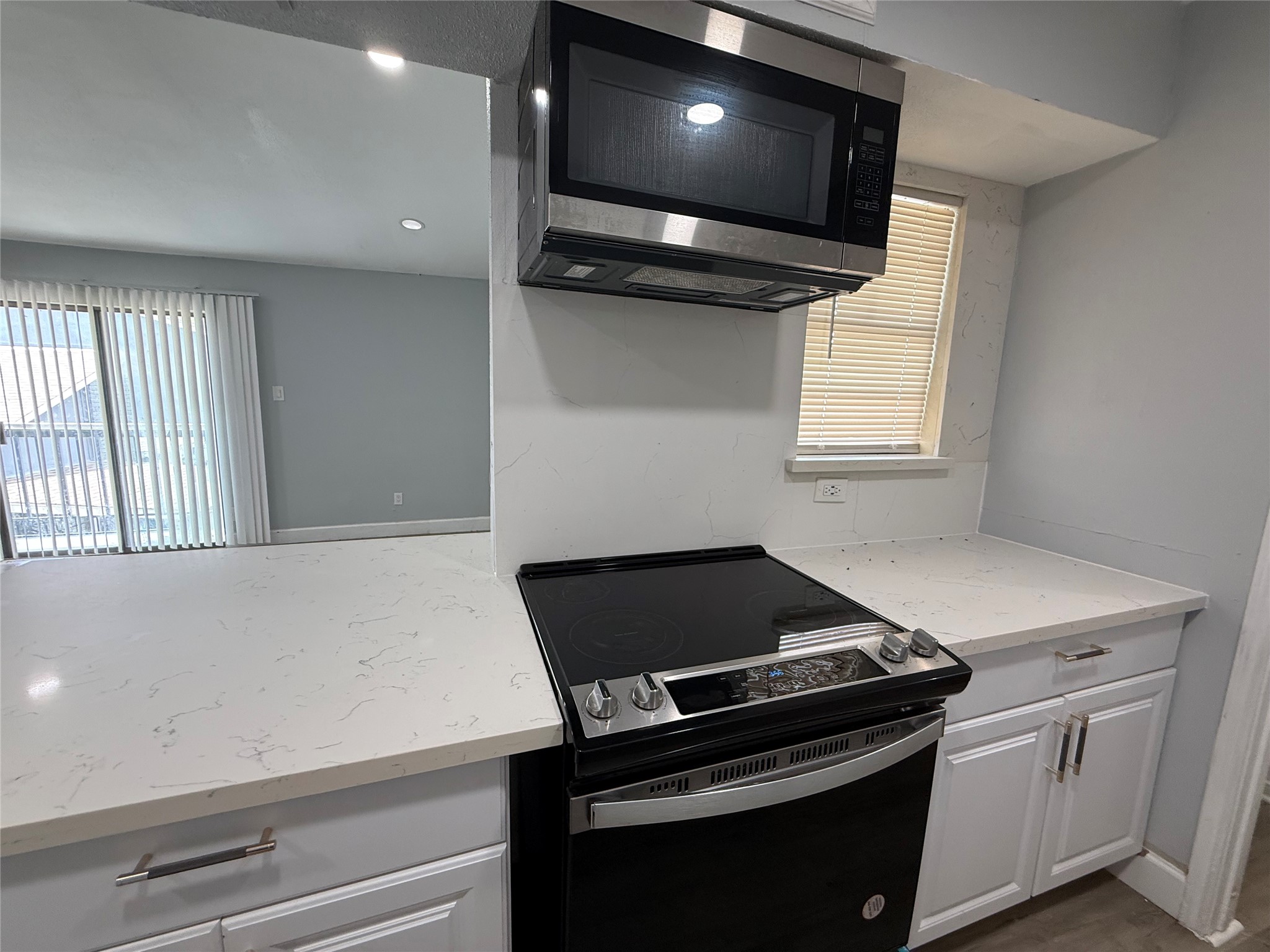 Kitchen is open to the living area and offers so much counter and cabinet space.