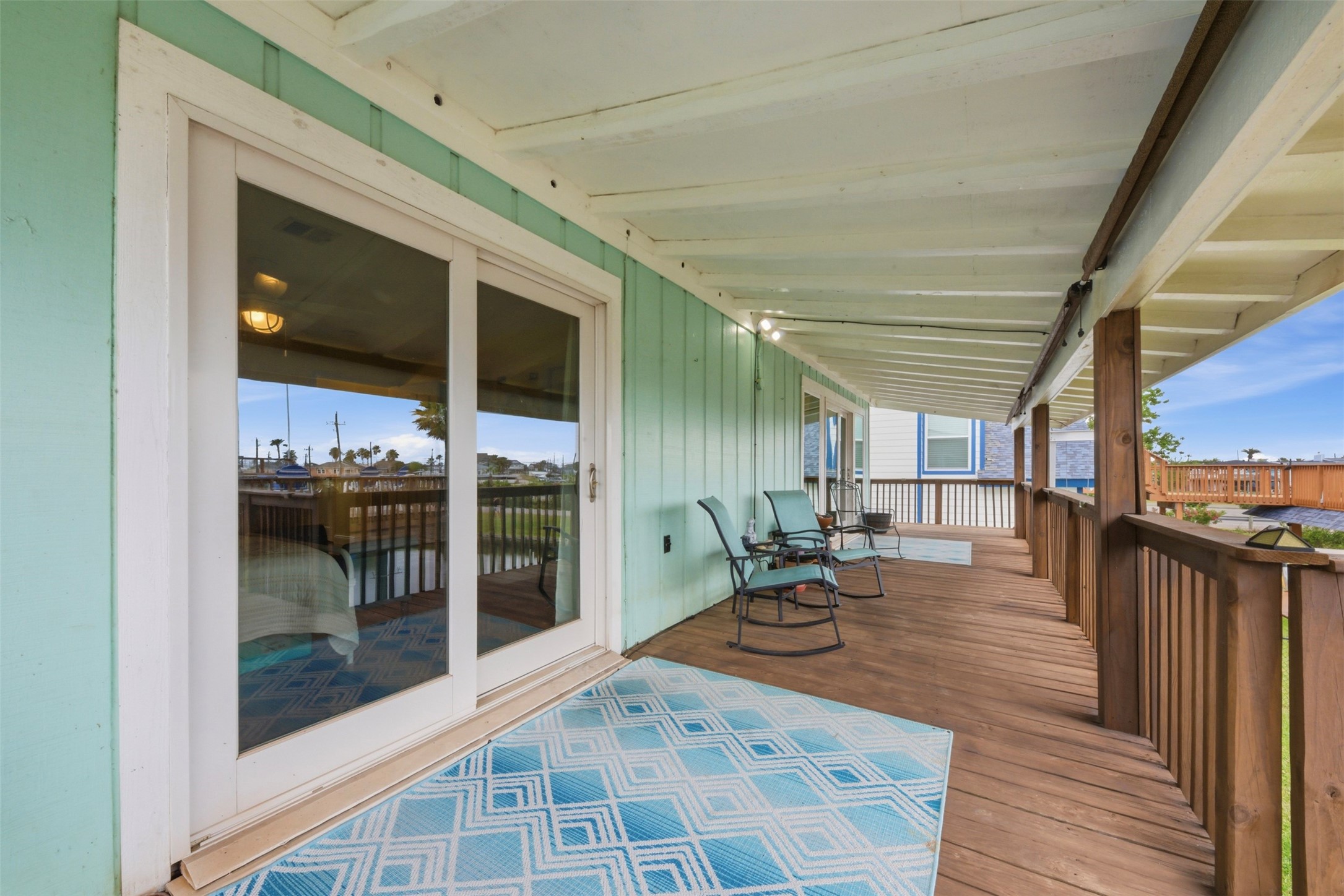 Enjoy morning coffee or a night cap protected from a rain storm under your covered catwalk!