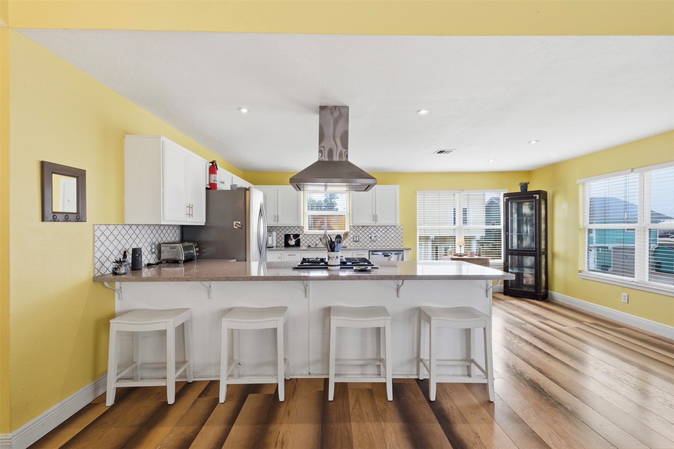Remodeled kitchen featuring stainless appliances and quarts countertops!