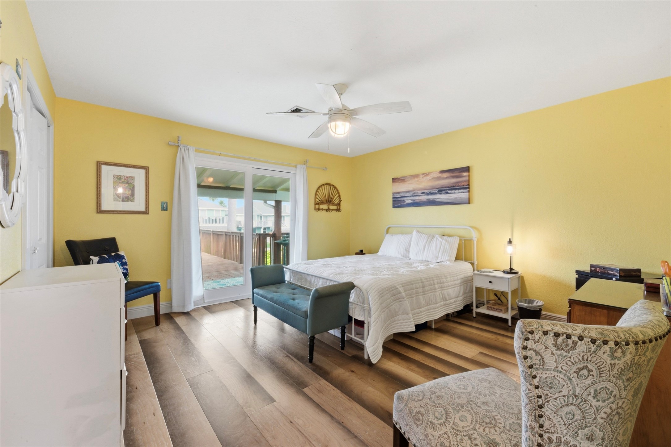 2nd level primary bedroom opening up to your covered catwalk and oversized deck!