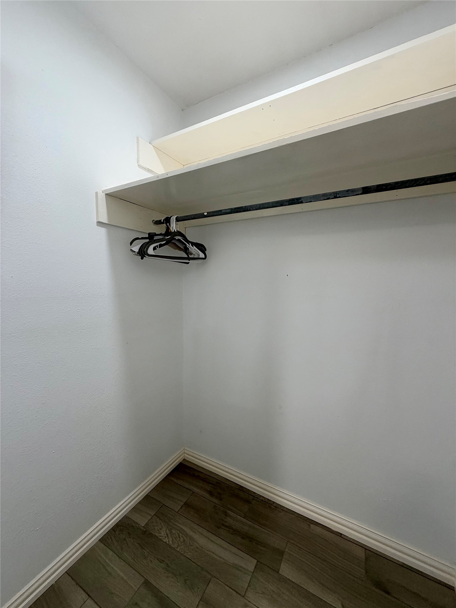 Primary closet offers additional storage can be accessed through the primary bathroom.