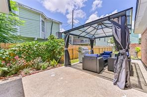 Large patio opens to full-size backyard