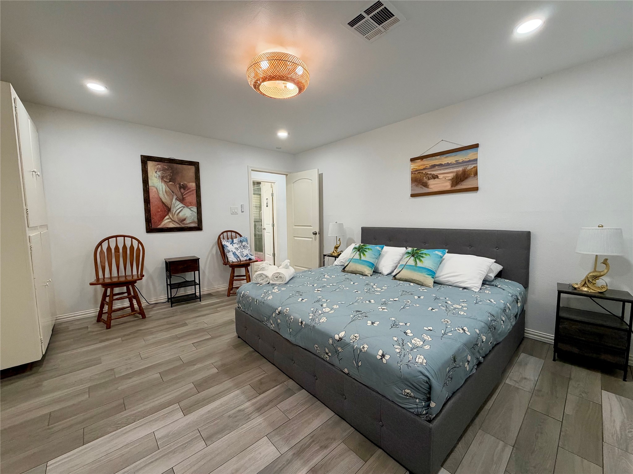 Primary bedroom, plenty large enough for the King-sized bed and sitting area.