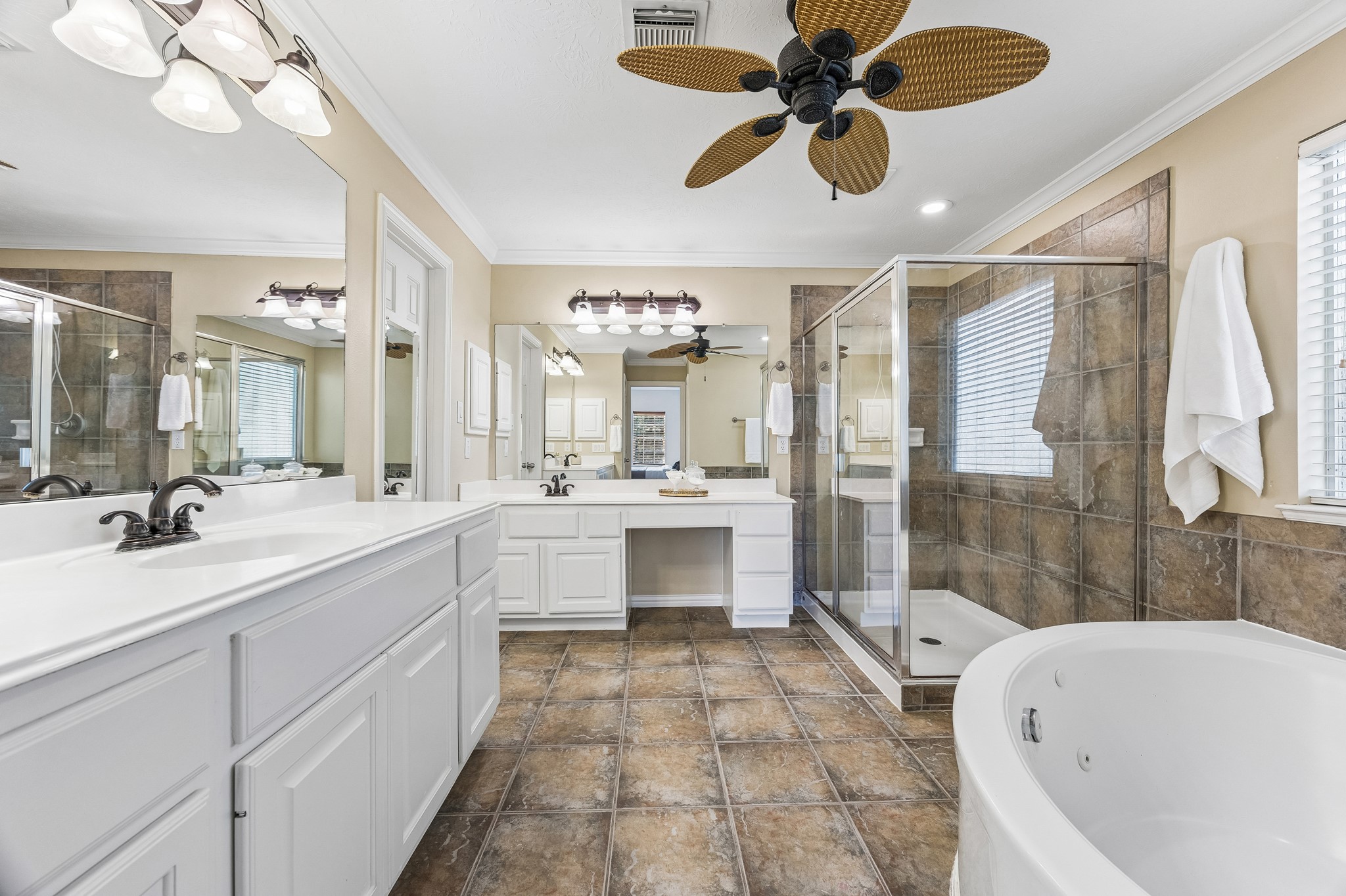Turn your everyday routine into a little luxury with a soaking tub and spacious vanity.