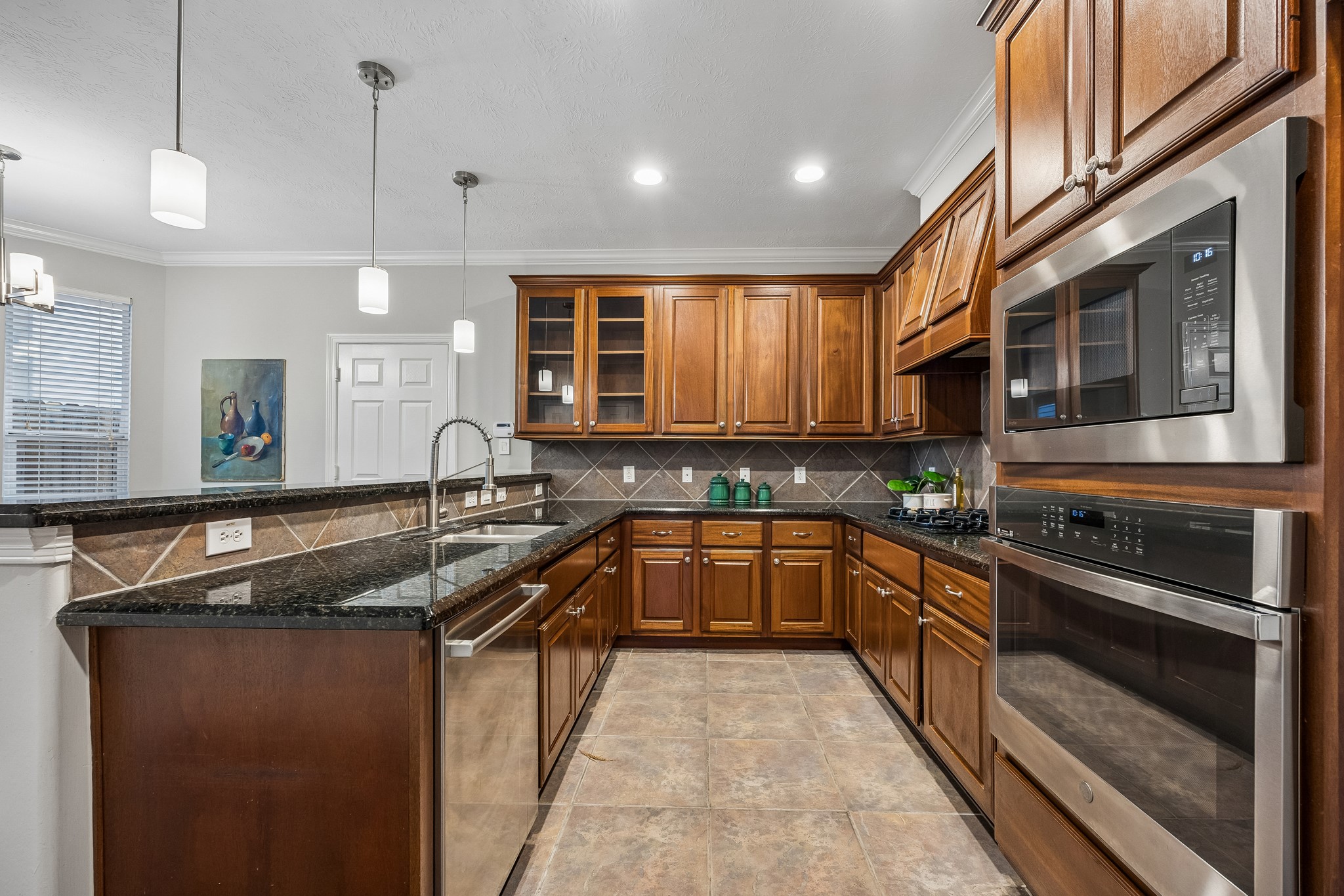 A kitchen made for cooking, hosting, and being part of the conversation.