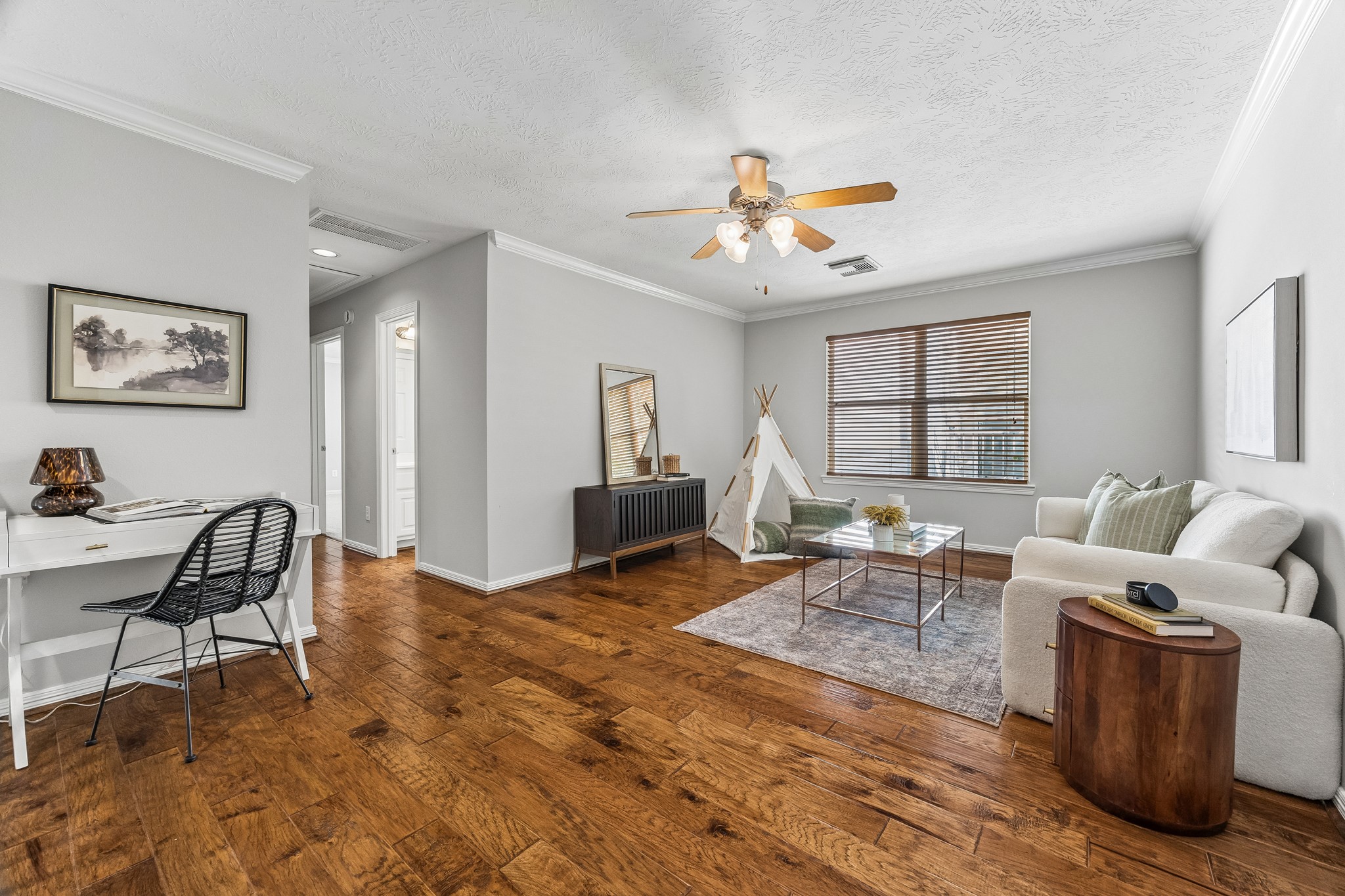 A flexible space for movie nights, relaxing, or creating a cozy retreat of your own.