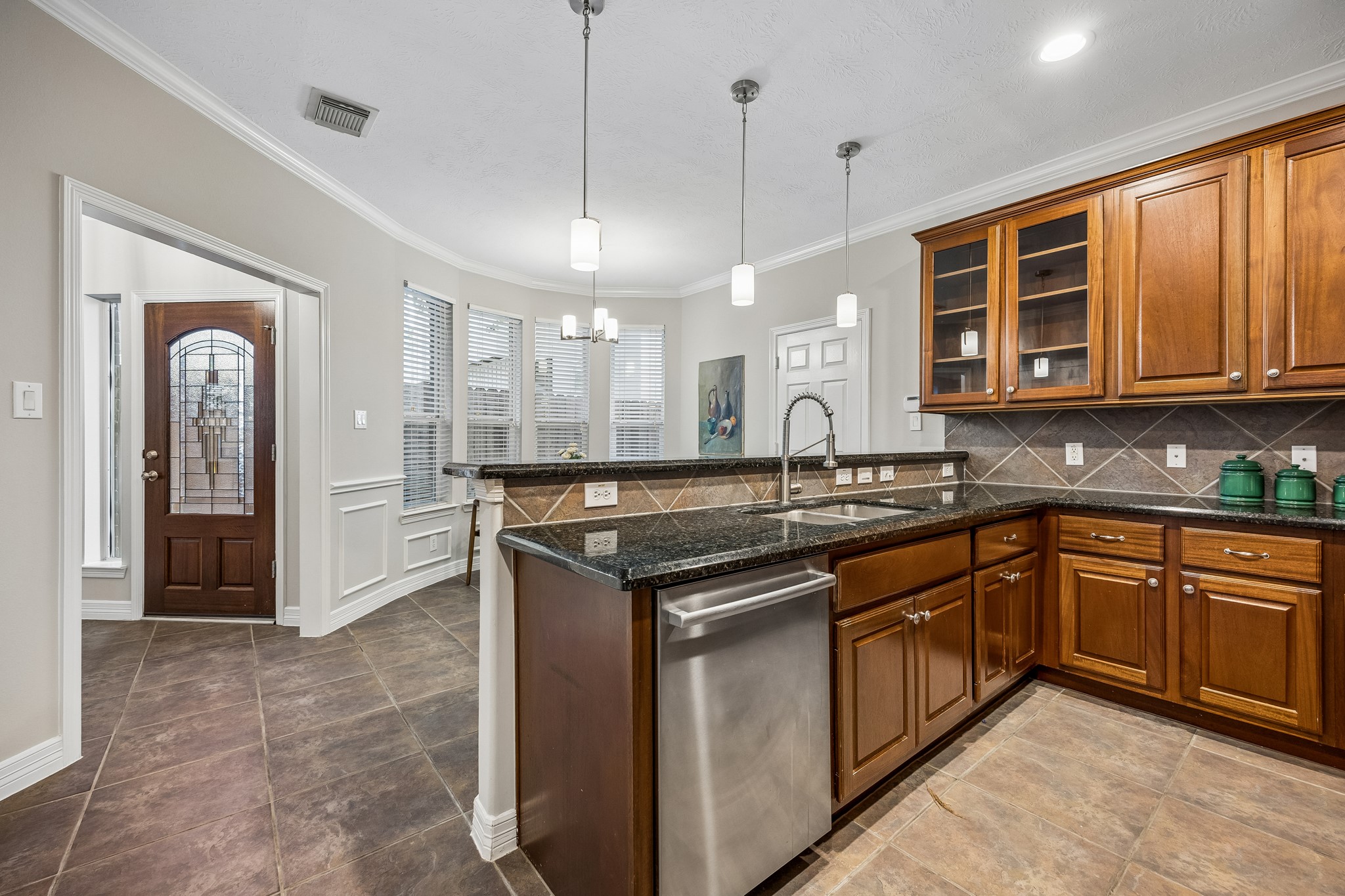 Generous cabinetry and counter space make everyday meal prep and entertaining a breeze.