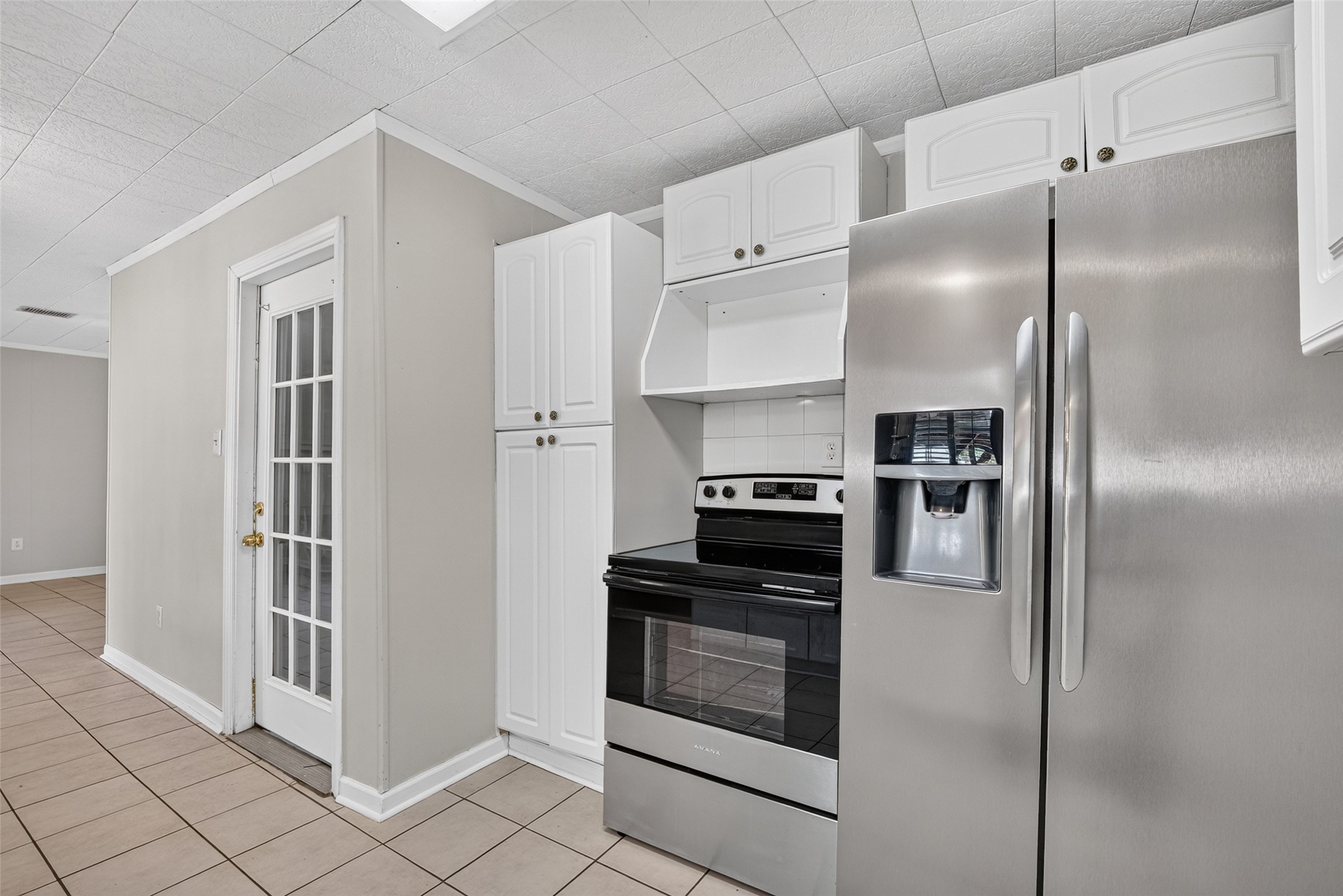 Door leads to garage. Utility room located right inside the garage Door leads to garage. Utility room located right inside the garage