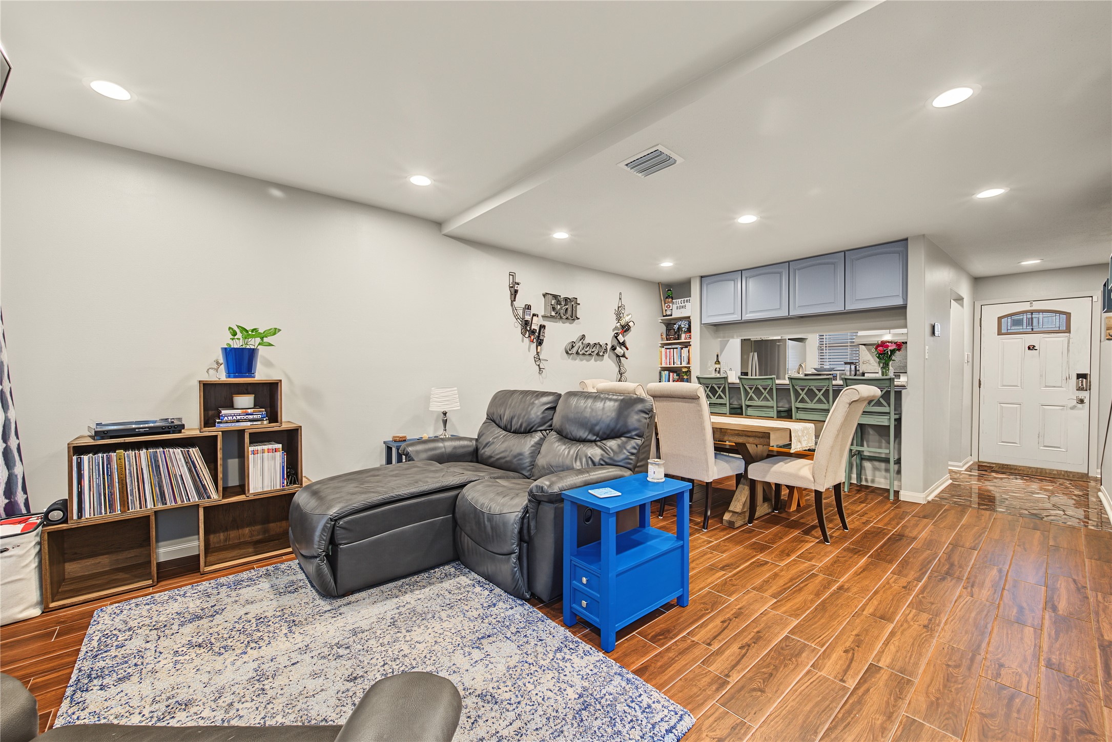 Open living and dining areas with recessed lighting Open living and dining areas with recessed lighting