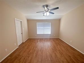 Another view of the primary bedroom
