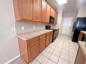 Lots of cabinet space with built-in microwave