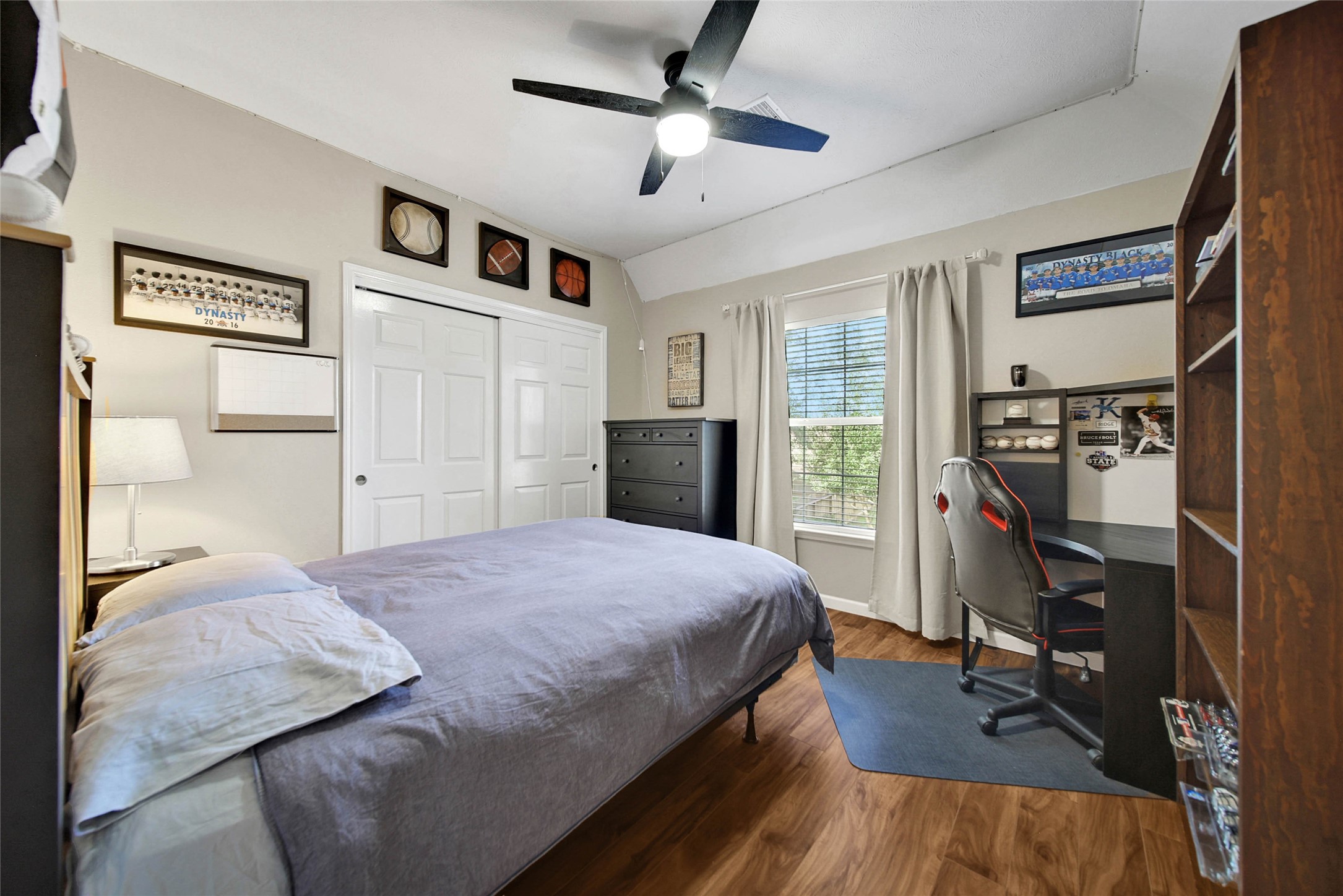 Bedroom #4 is on the right side of the home and overlooks the side yard.