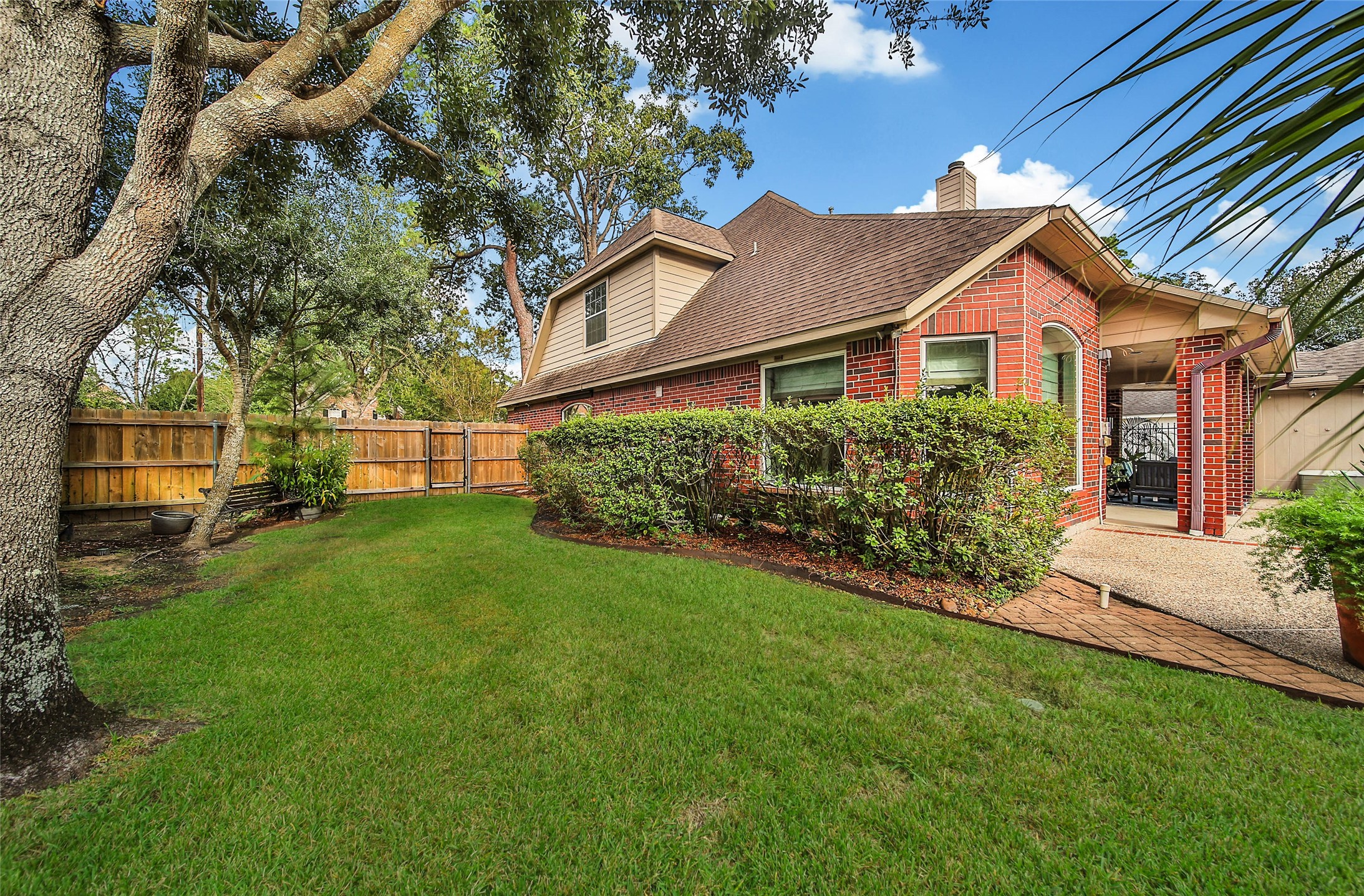 The side yard still provides plenty of green space for your furry friends or a play set, etc.
