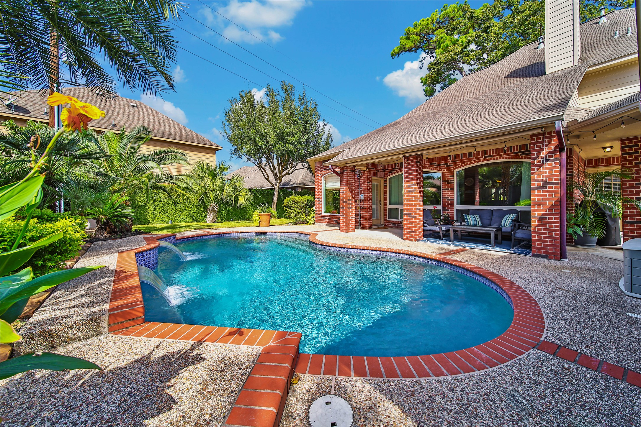 Gorgeous landscaping makes this feel like your own personal tropical oasis!