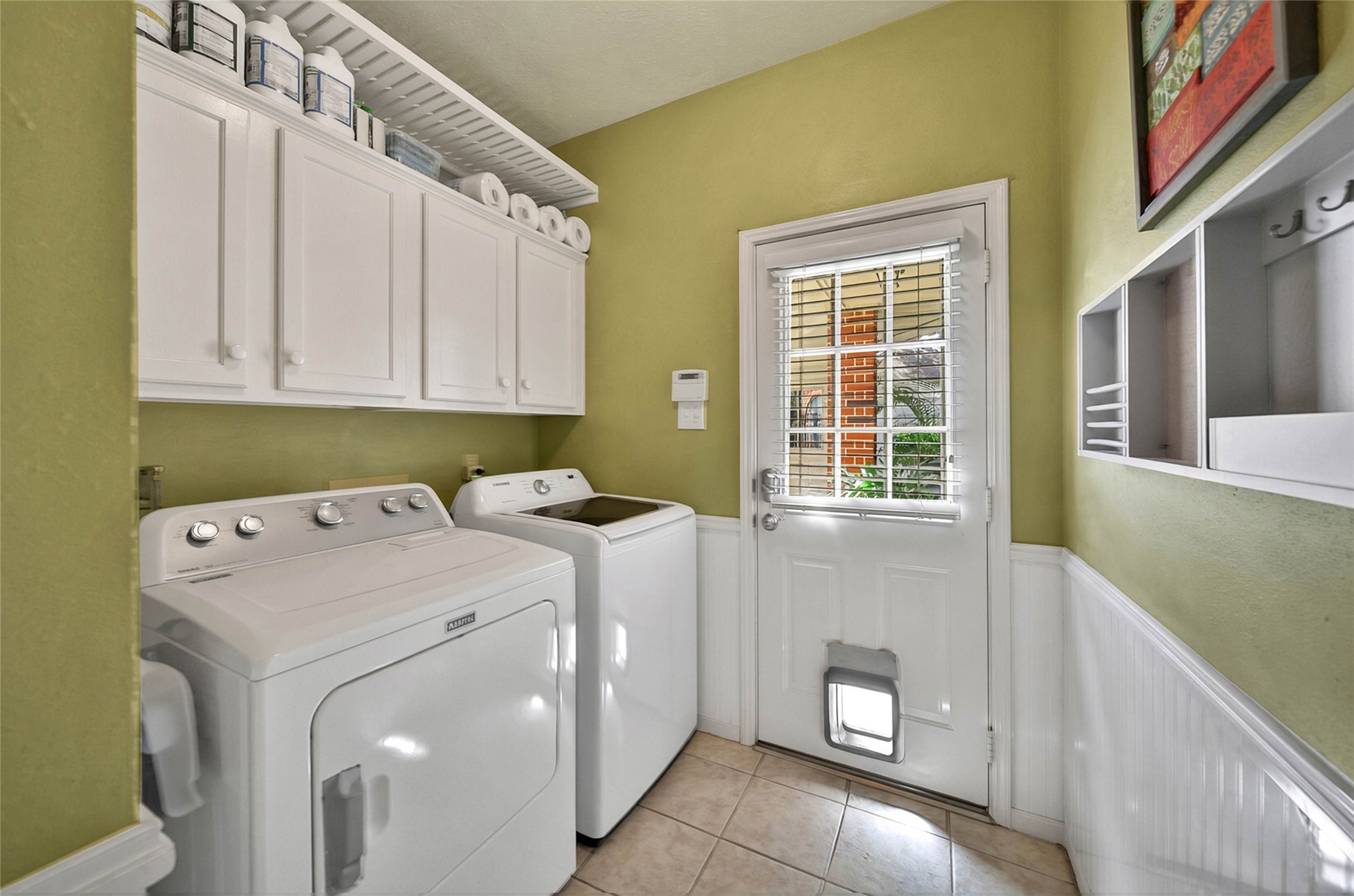 Plenty of storage space in your utility room that conveniently connects to pool access.