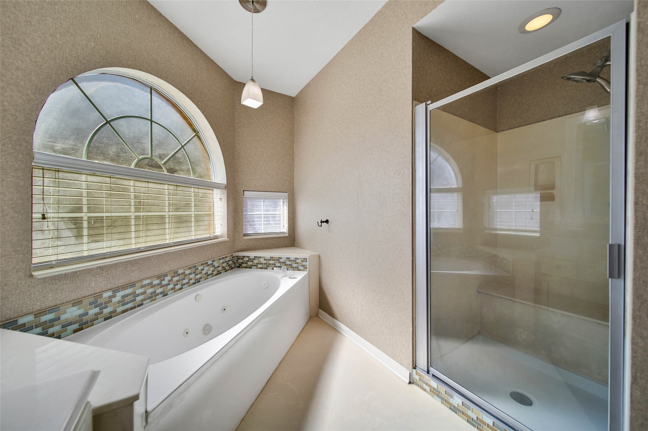 Large jacuzzi tub and separate shower